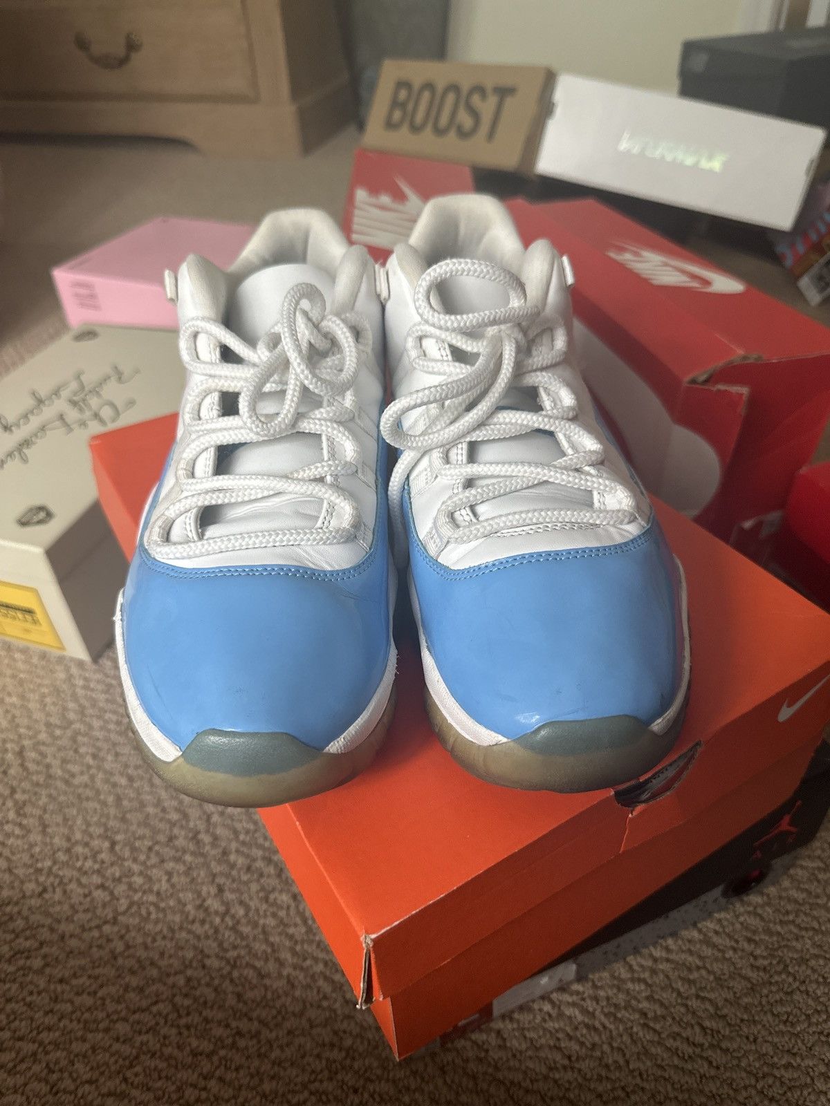 image of Jordan Brand 11 Low Unc Shoes in Baby Blue, Men's (Size 12)