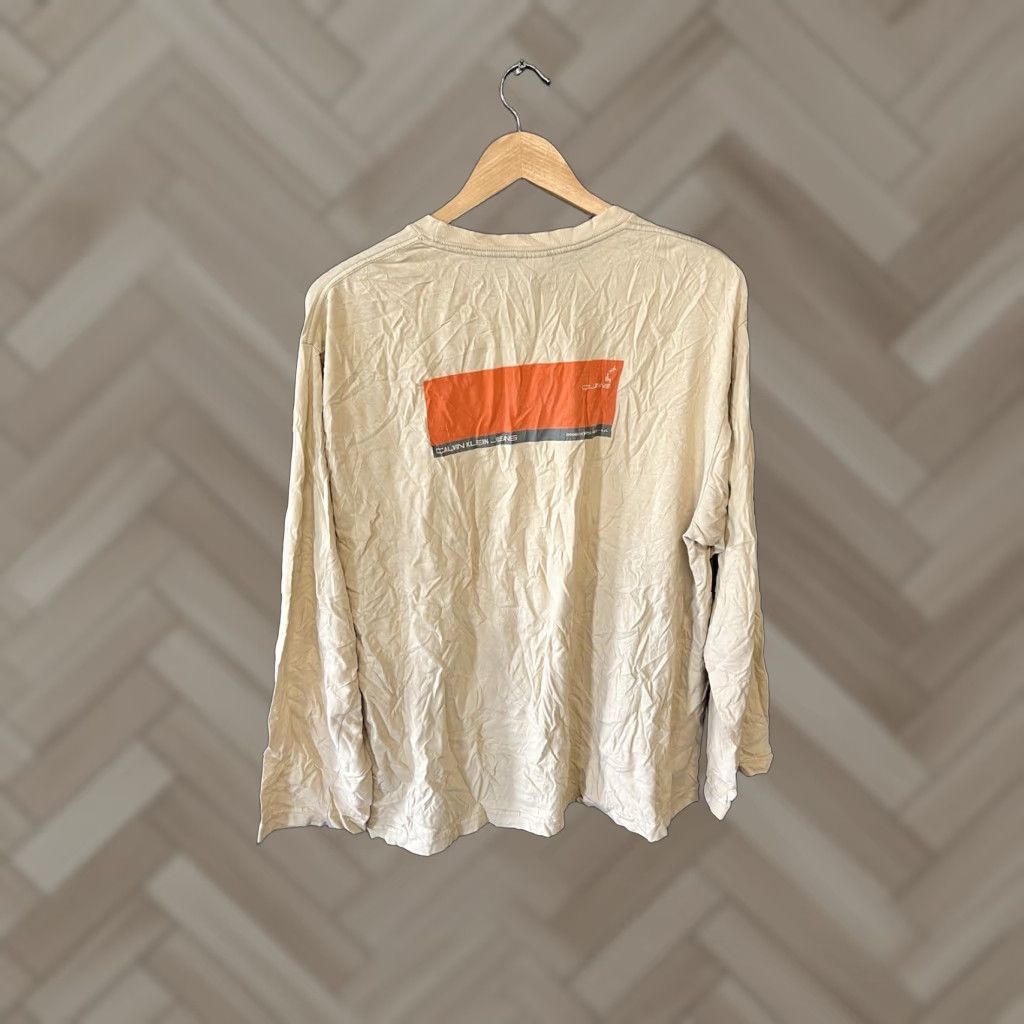 Calvin Klein VINTAGE Calvin Klein Mens Yellow Graphic T-shirt Long Sleeve Large Size US L / EU 52-54 / 3 - 1 Thumbnail