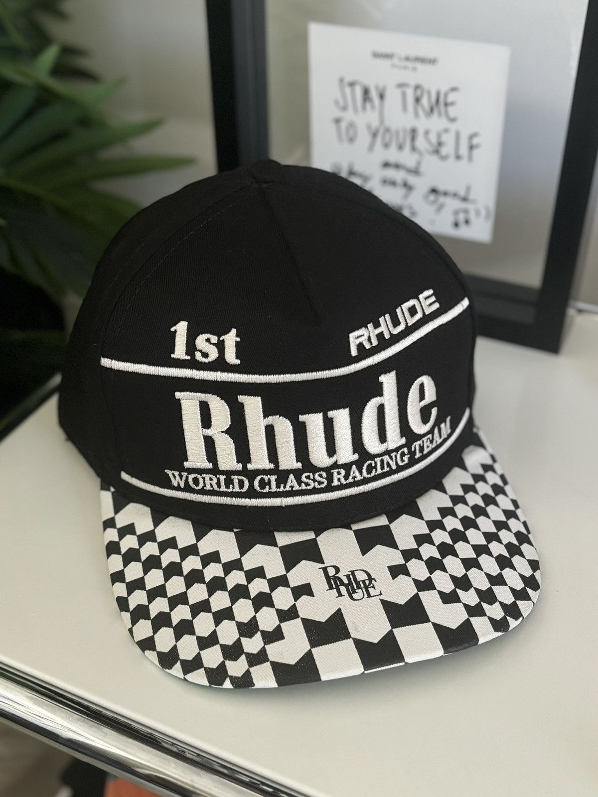 image of Rhude “Checkered Flag Racing F1” Hat in Black, Men's
