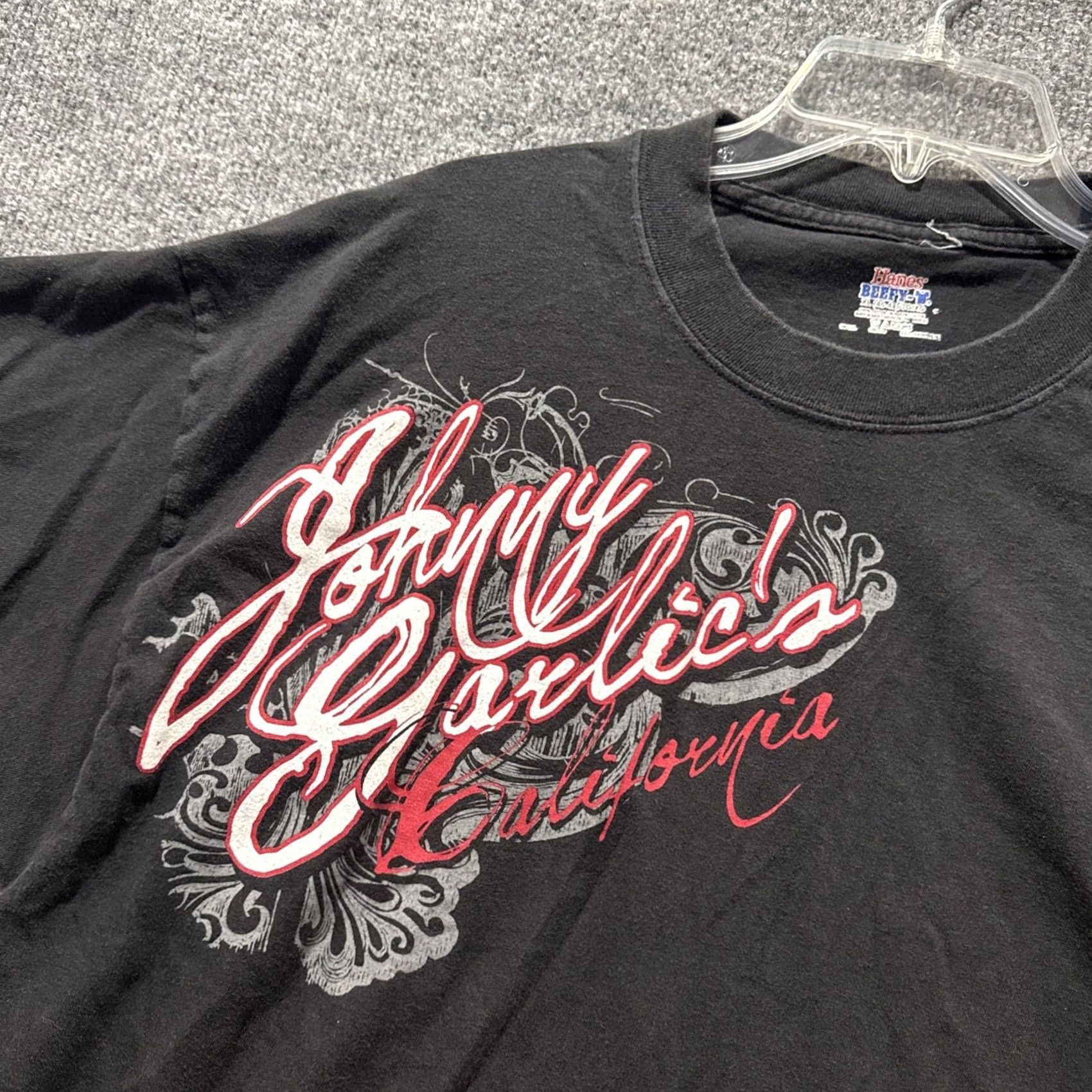 Hanes VINTAGE Johnny Garlic’s California Pasta Grill Grunge Y2K Black Short Sleeve T-Shirt XL Mens Hanes XL Black Grunge Y2K T-Shirt Size US XL / EU 56 / 4 - 2 Thumbnail