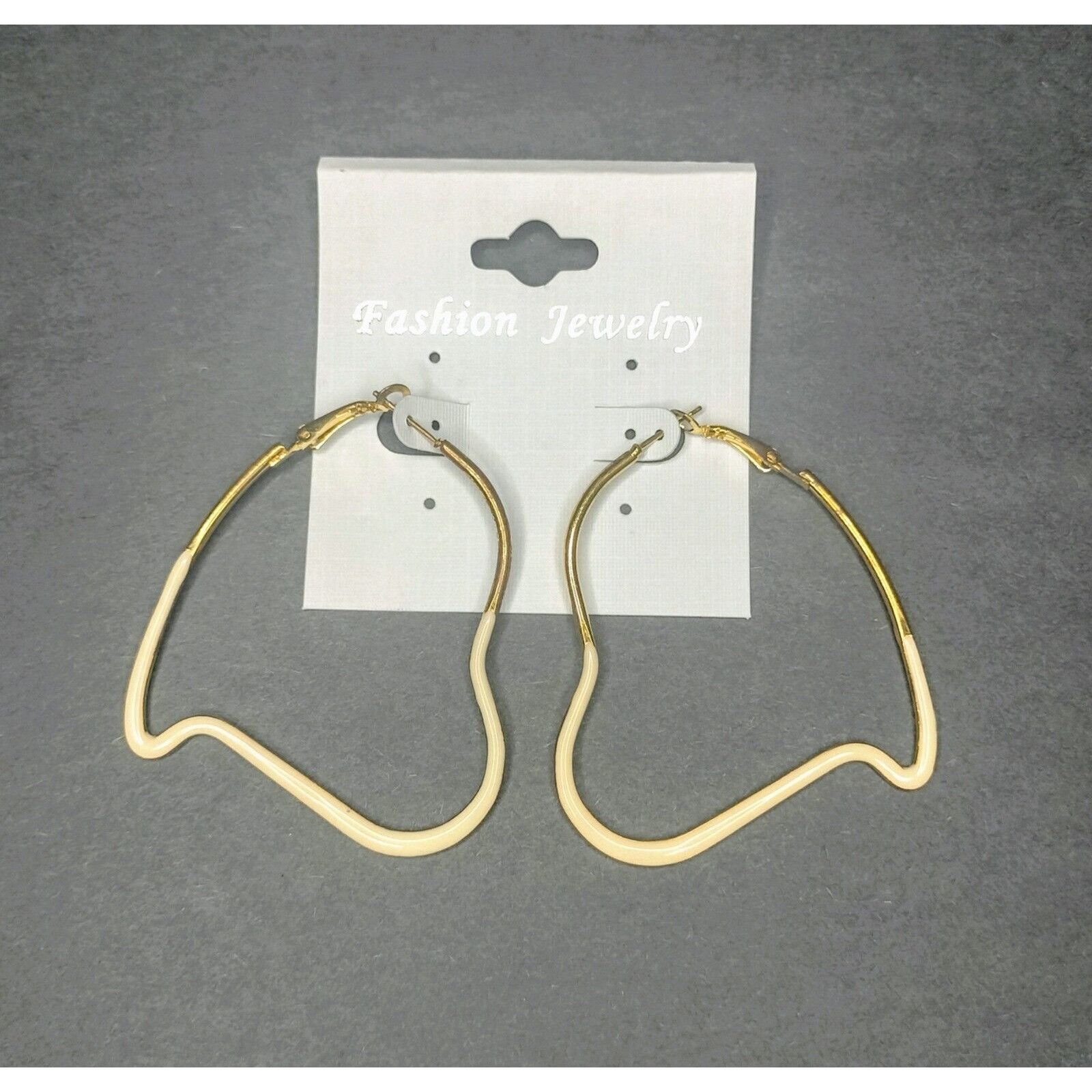 Other Hoop Earrings Fashion Jewelry Eggshell White Asymmetrical He Size ONE SIZE - 1 Thumbnail
