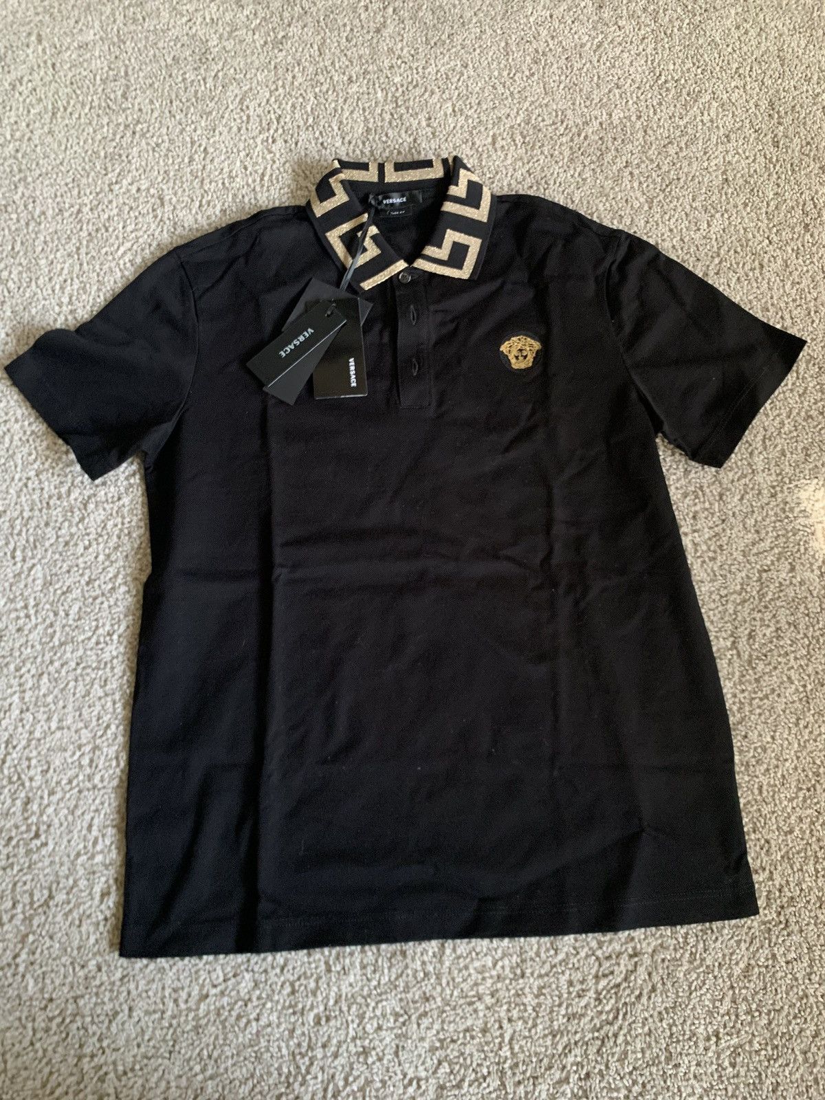 image of Versace Greca Short-Sleeved Polo Shirt Size Small in Black/Gold, Men's