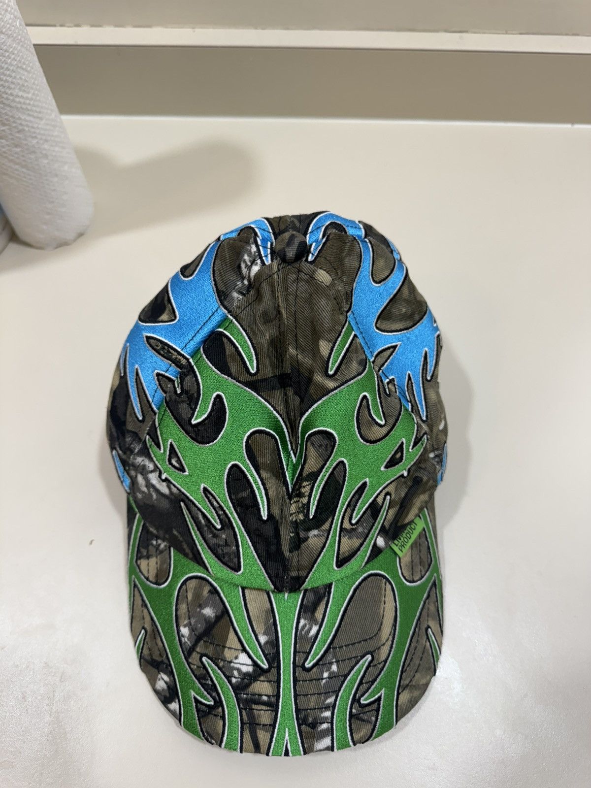 The GV Gallery Living Product Camo Flame Hat Size ONE SIZE - 1 Thumbnail