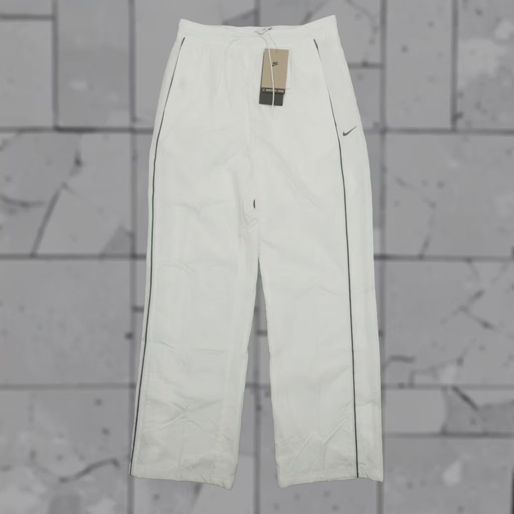 Nike NIKE Windrunner Beige High-Waisted Woven Pants Women's S Regular Wide-Leg Open-Hem 40 SPF Knit Nylon Pockets Size 28" / US 6 / IT 42 - 1 Thumbnail