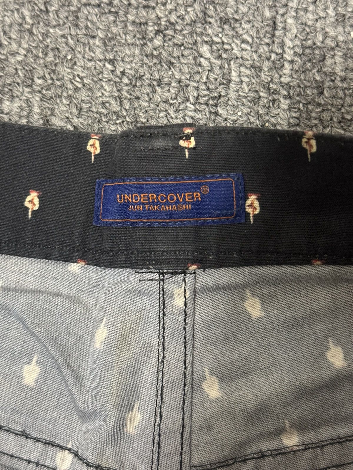 Undercover 12aw middle finger short