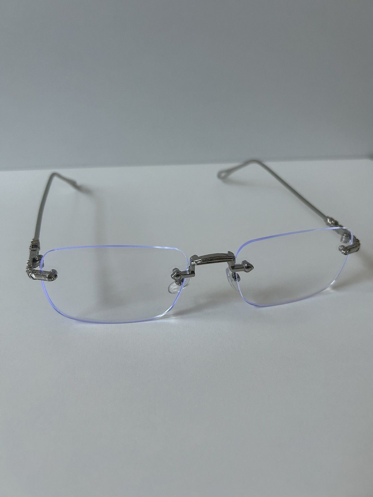 Japanese Brand 90s Y2K style silver cross rimless blue tint lux glasses Size ONE SIZE - 1 Thumbnail