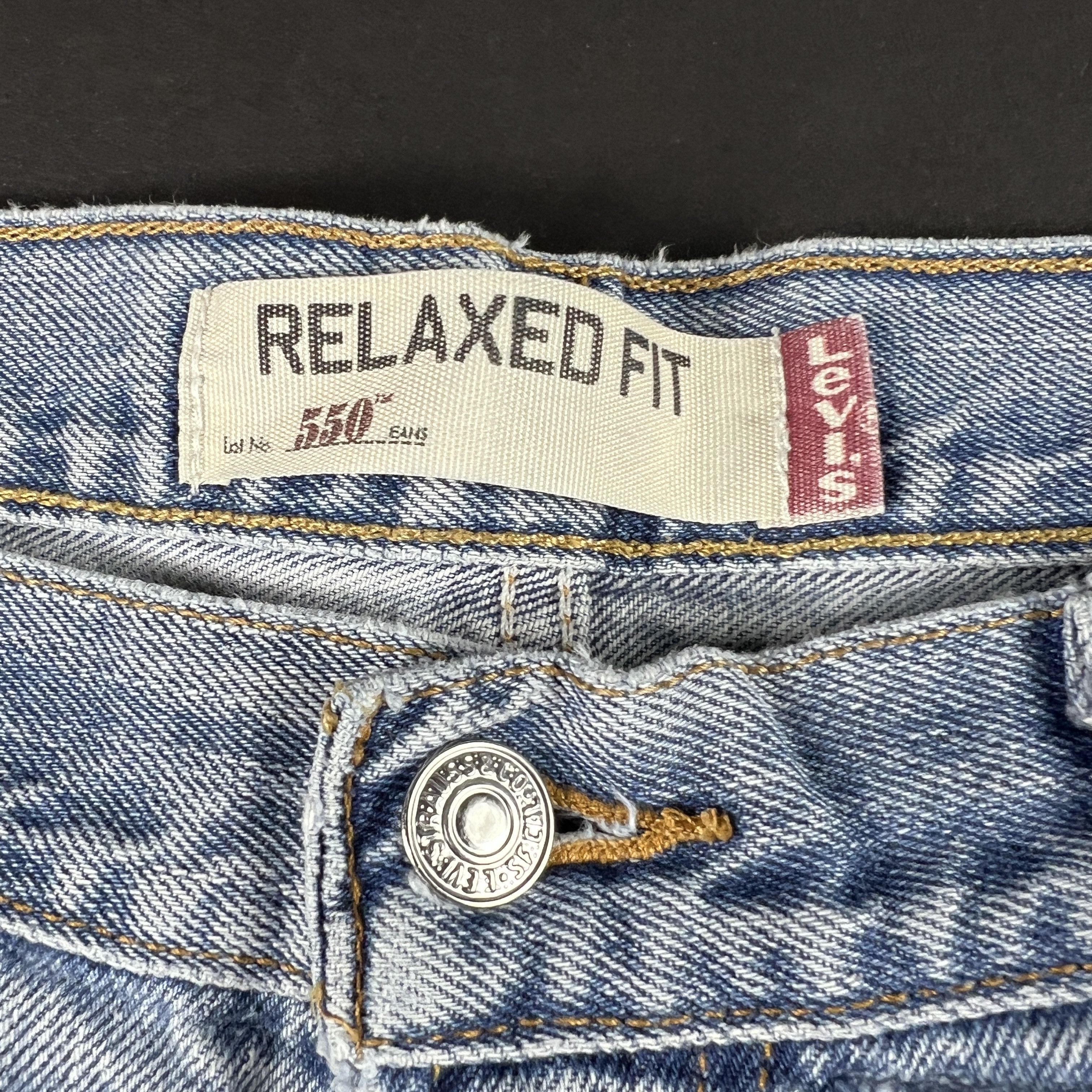 Y2K Levi's Jeans 550 Relaxed Blue Faded Thrashed Denim