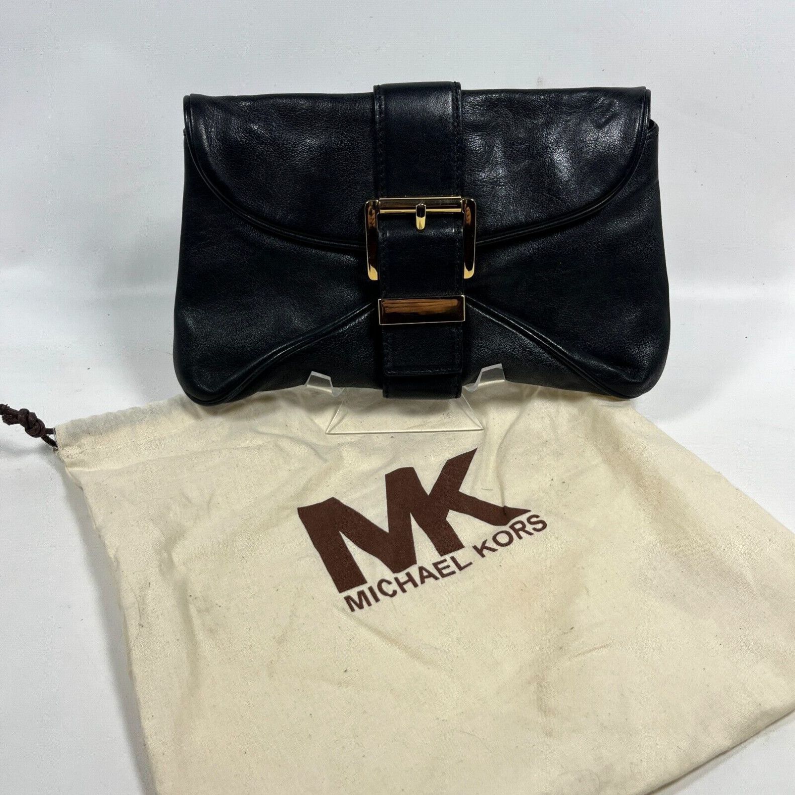 image of Michael Kors Clutch Heidi Genuine Leather Luggage Gold Hardware Black in White, Women's