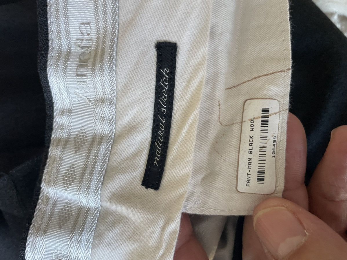 Jesse Model Wool pleated trousers