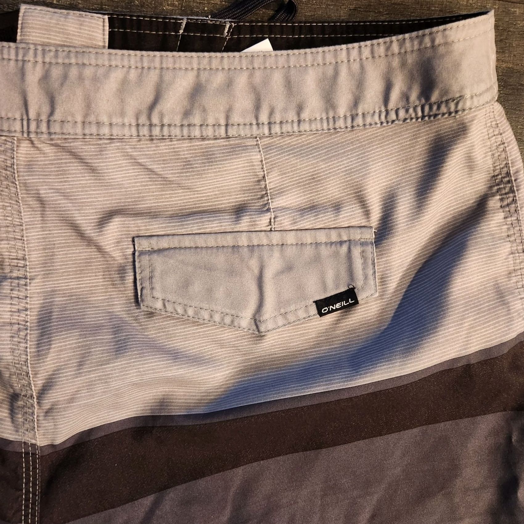 O'Neill O’NEILL Men’s Board Shorts 34 Swim Trunks Performance Gray Striped Fade Bottom Mens Beach Surfing Regular Size 34 Size US 34 / EU 50 - 6 Thumbnail