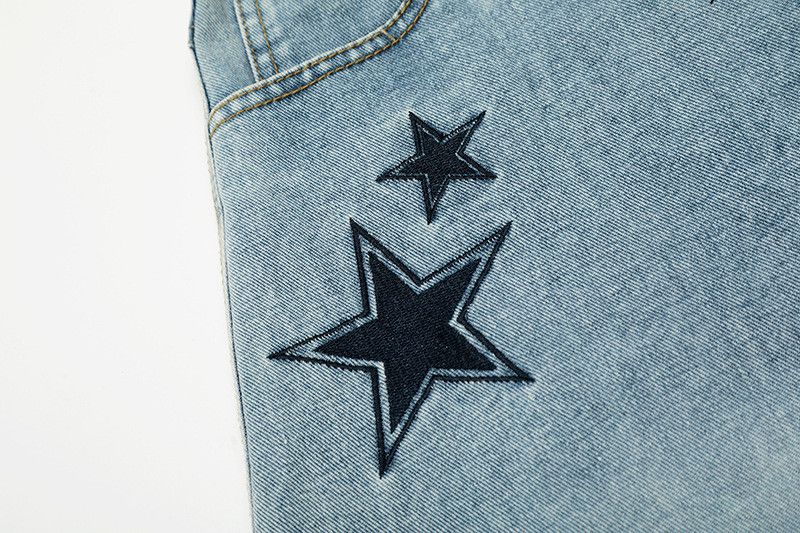 Vintage star embroidered distressed washed curved jeans