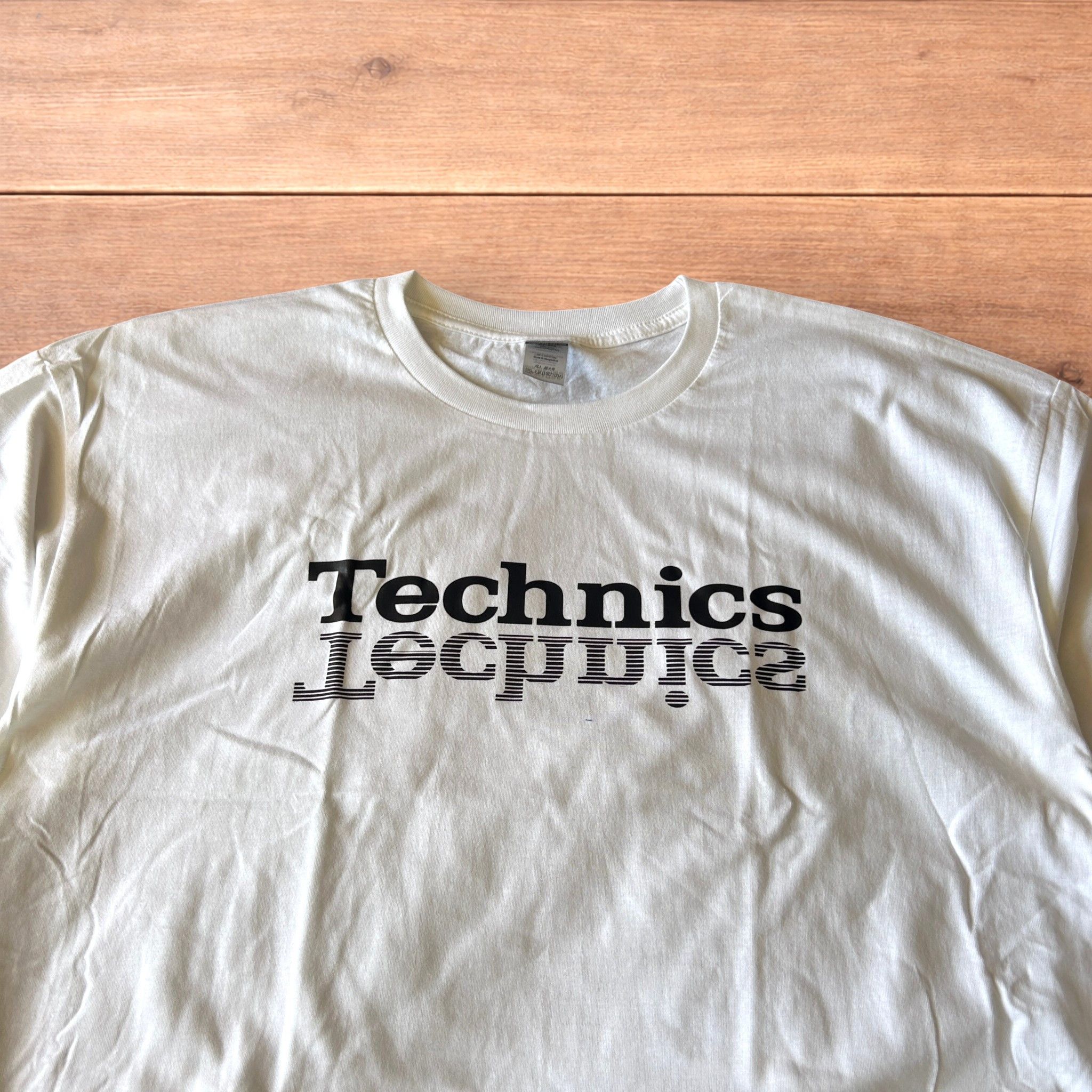 Japanese Brand Technics Music Dj tshirt in white with front graphic print. Size US M / EU 48-50 / 2 - 3 Thumbnail
