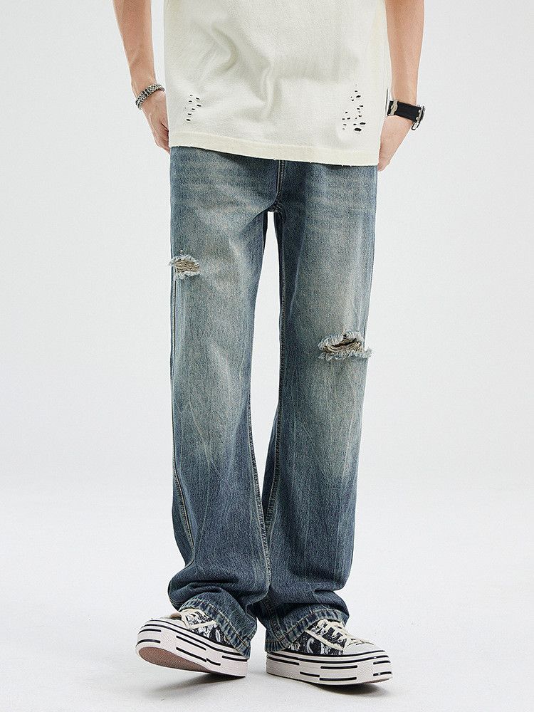American flared vintage distressed washed ripped jeans