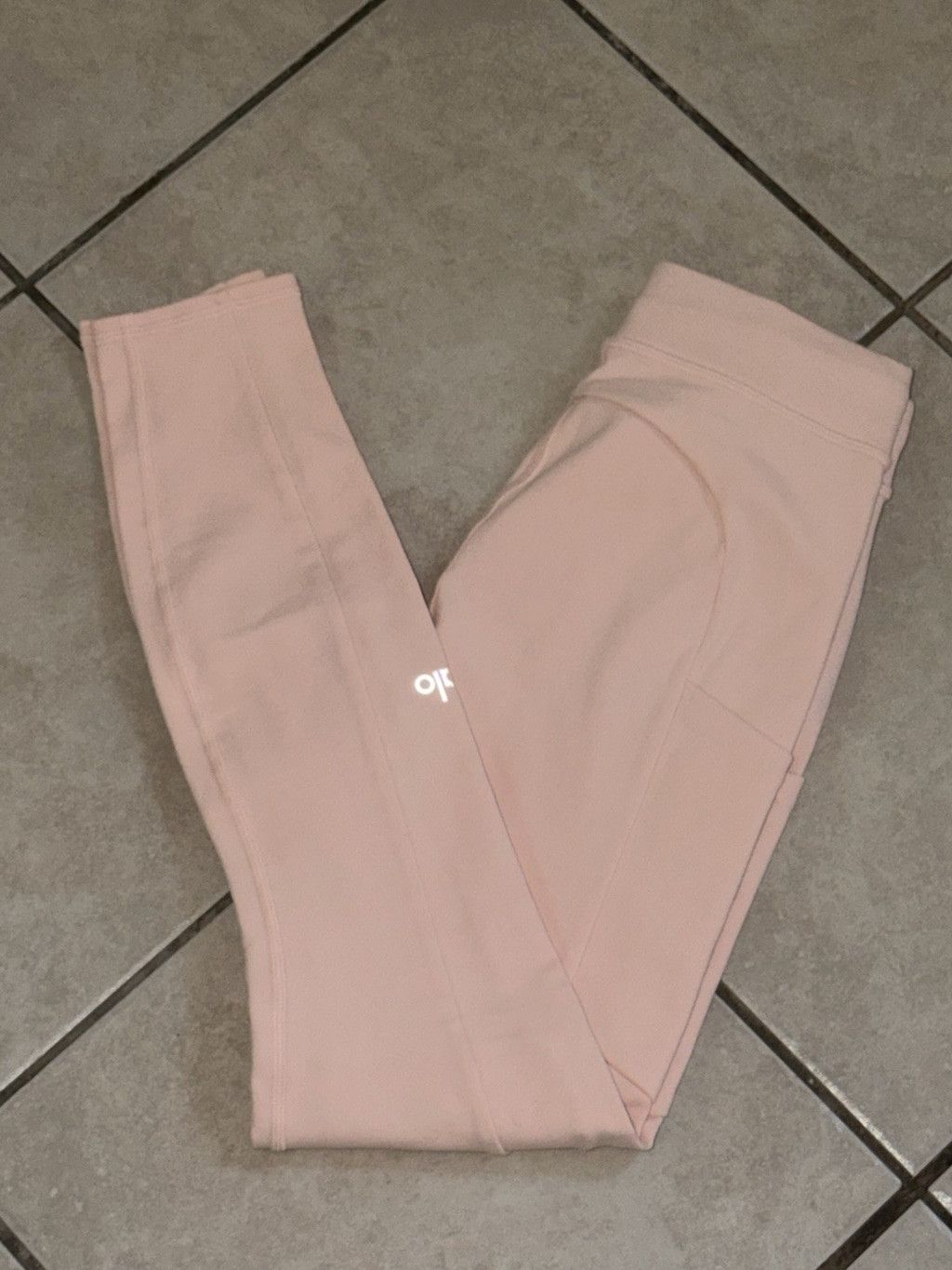 Alo Yoga ALO YOGA CHECKPOINT TIE FRONT LEGGING LIGHT NEON ORANGE XS Size 26" / US 2 / IT 38 - 1 Thumbnail