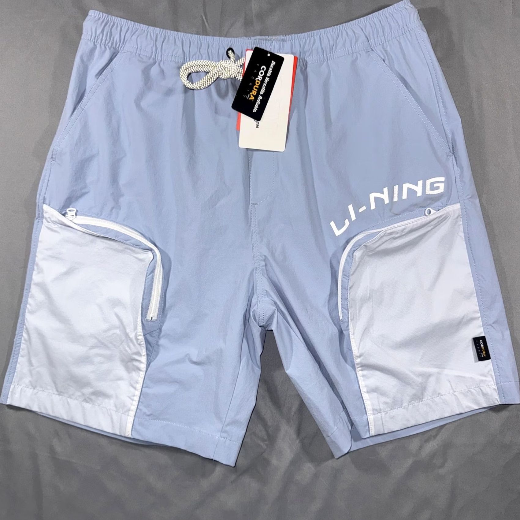 Li-Ning Li-Ning Shorts Mens Large Blue Cordura Drawstring Pocket Running Athletic Quick Dry Breathable Pockets Slim? Relaxed Size US 33 - 2 Thumbnail