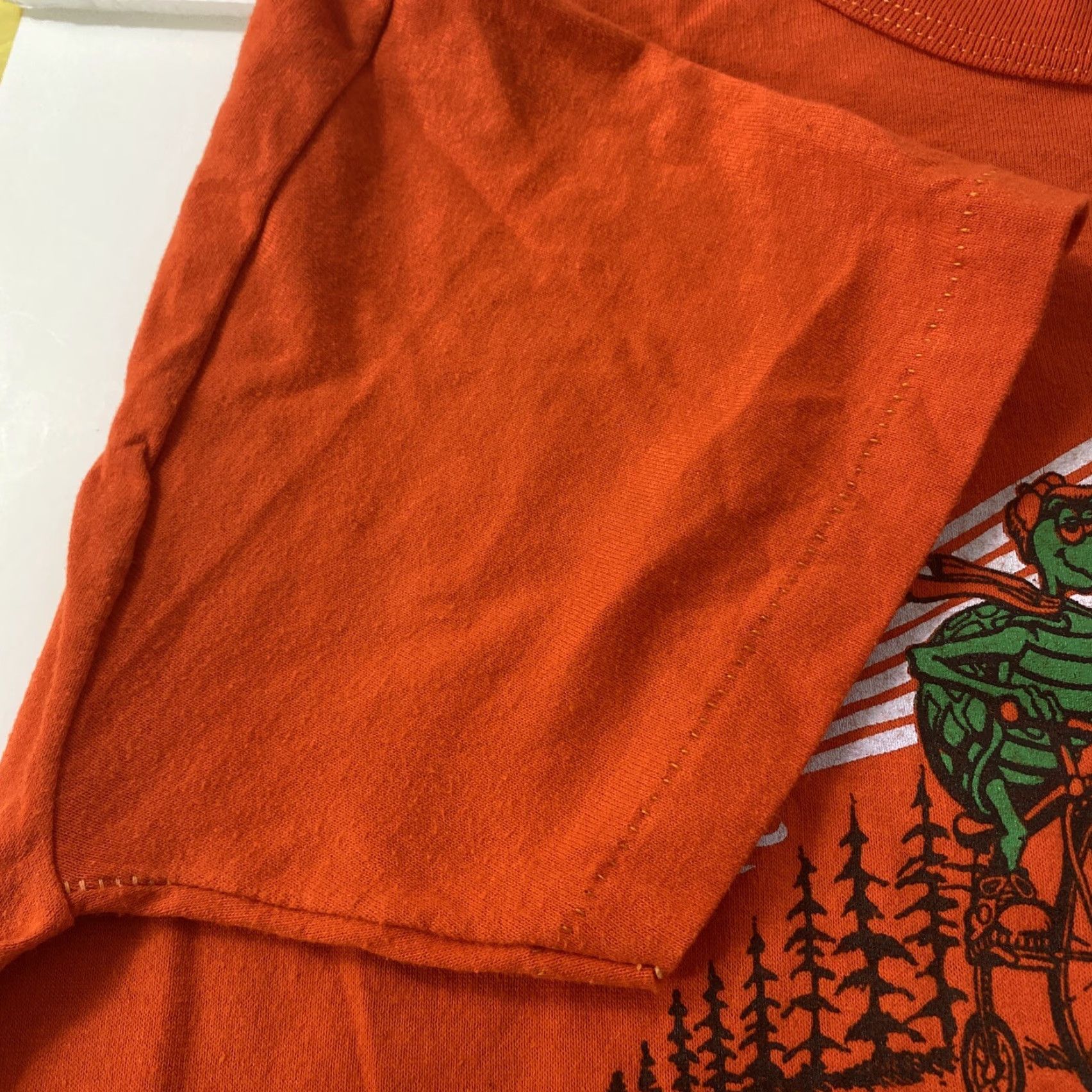 Russell Athletic VINTAGE Men’s M T-Shirt Orange Chena Hot Springs Bike Classic Turtles USA 1980s Redick Art Mens Newrch Sleeve Short Cotton Blend White? Size US M / EU 48-50 / 2 - 6 Thumbnail