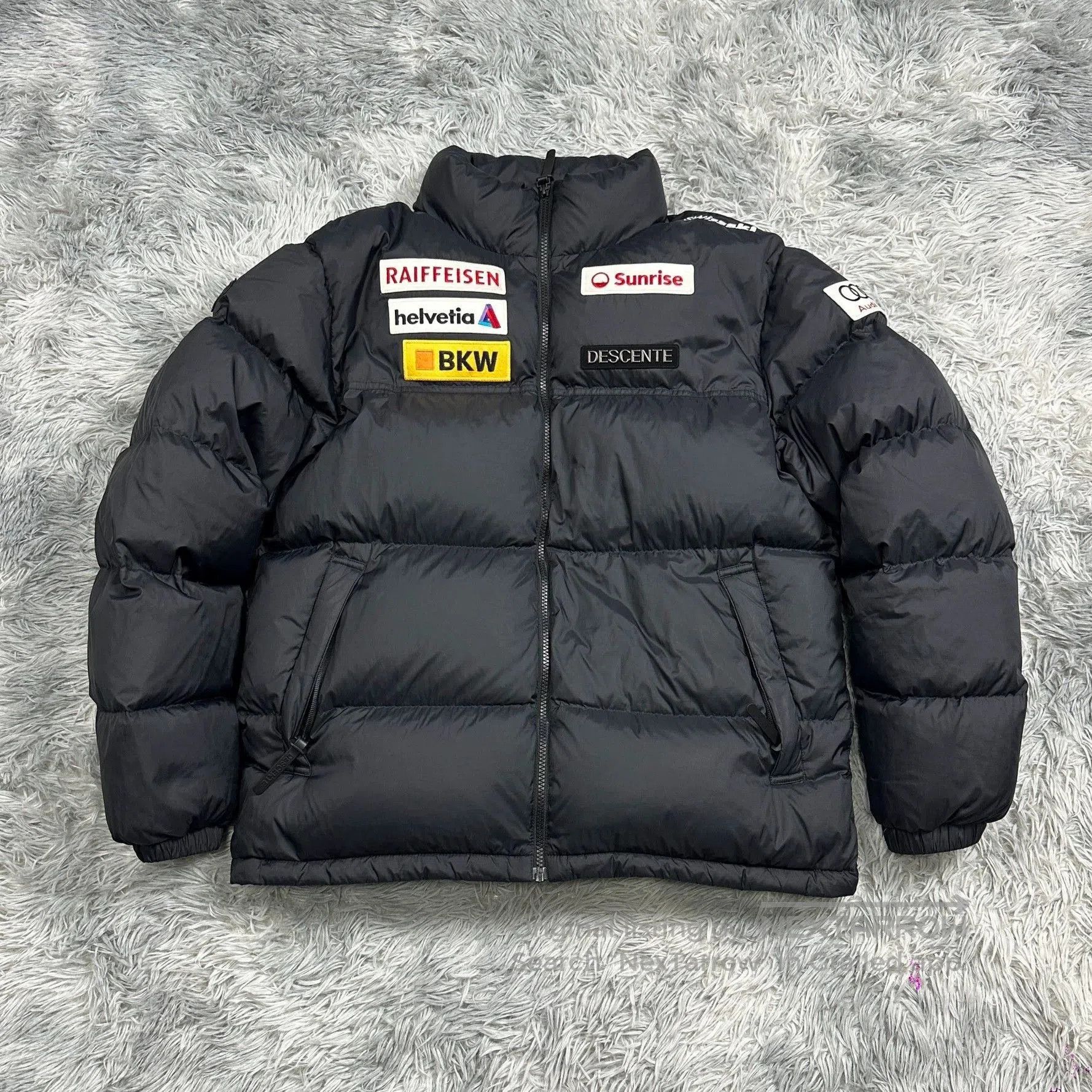 descente black embroidered puffer jacket limited edition.