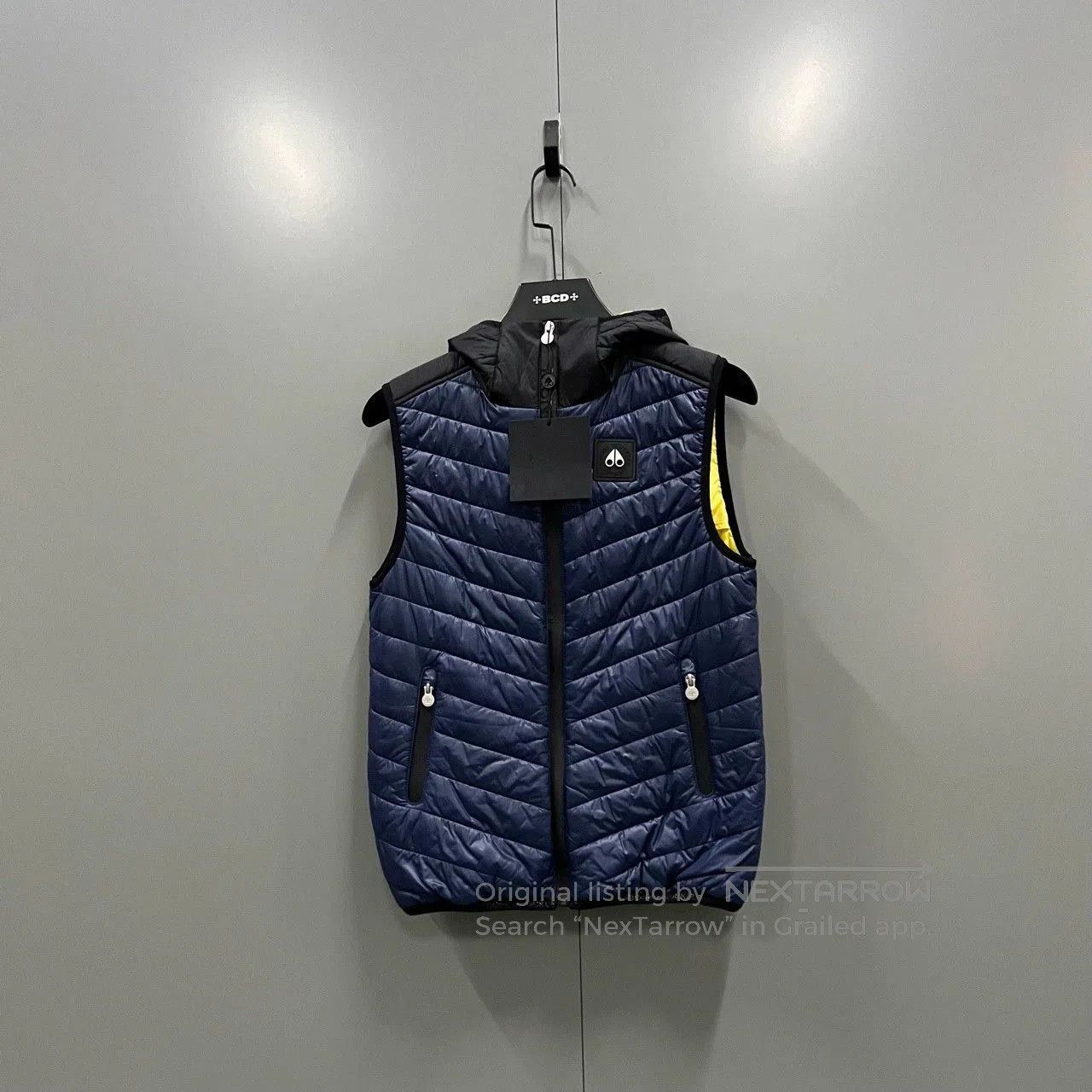 moose knuckles blue logo hooded vest.
