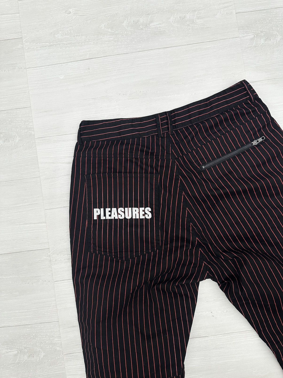 Pleasures Pleasures Red + Black Striped Zip Logo Denim Jeans Sz. 34 Size US 34 / EU 50 - 1 Thumbnail