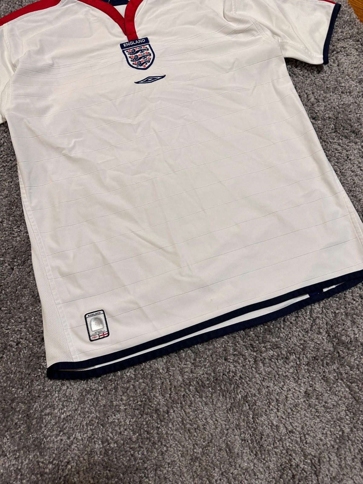 Umbro ENGLAND 2003 2005 HOME FOOTBALL SHIRT SOCCER JERSEY UMBRO L Size US L / EU 52-54 / 3 - 2 Thumbnail