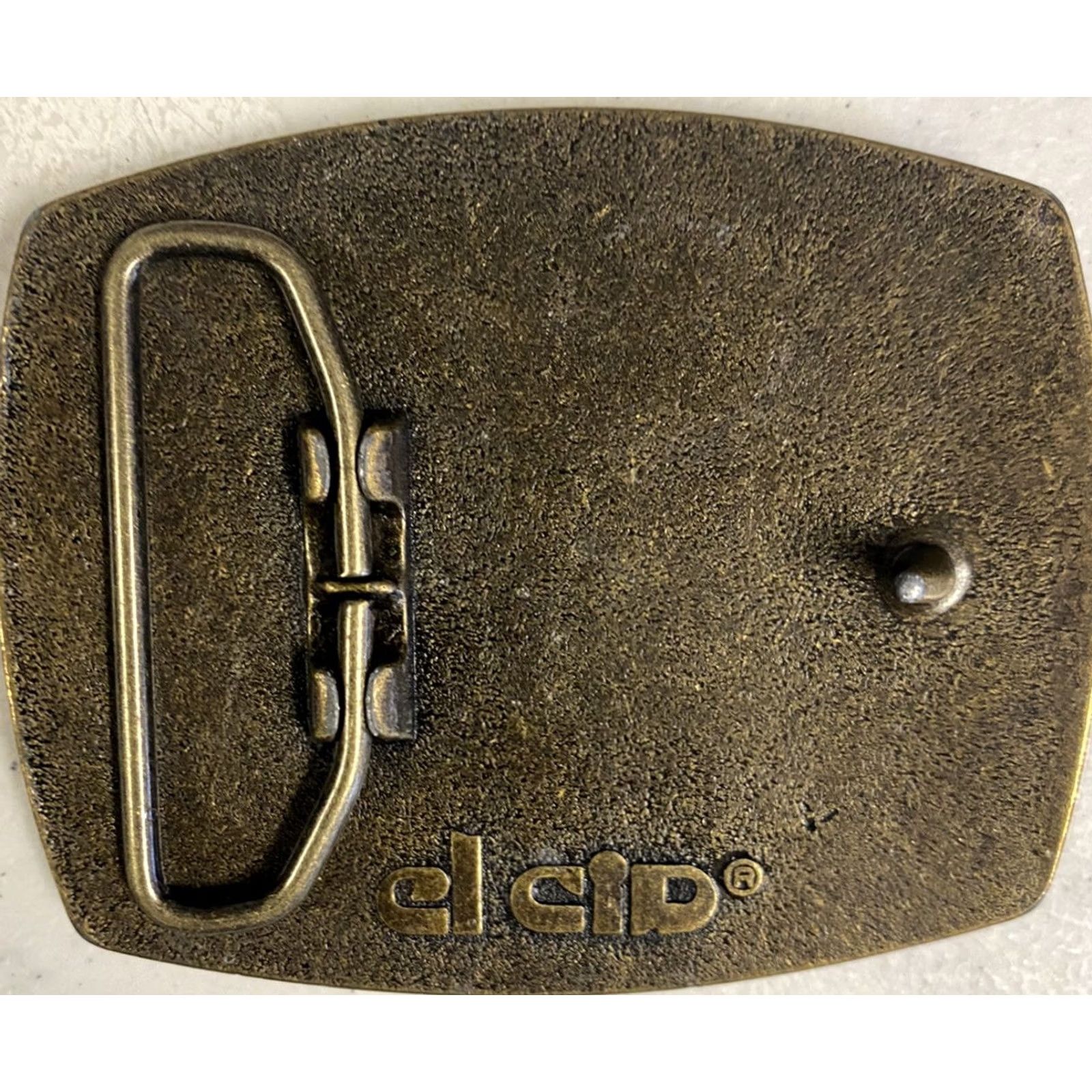 Vintage EL CID VINTAGE 1970s CASE EXCAVATOR RODEO CHAMPION BELT BUCKLE Unisex Adults Brass Plated / Leather Insert 1.85" Fits 3.10"(w) x 2.60"(h) Belt Width Size ONE SIZE - 2 Thumbnail