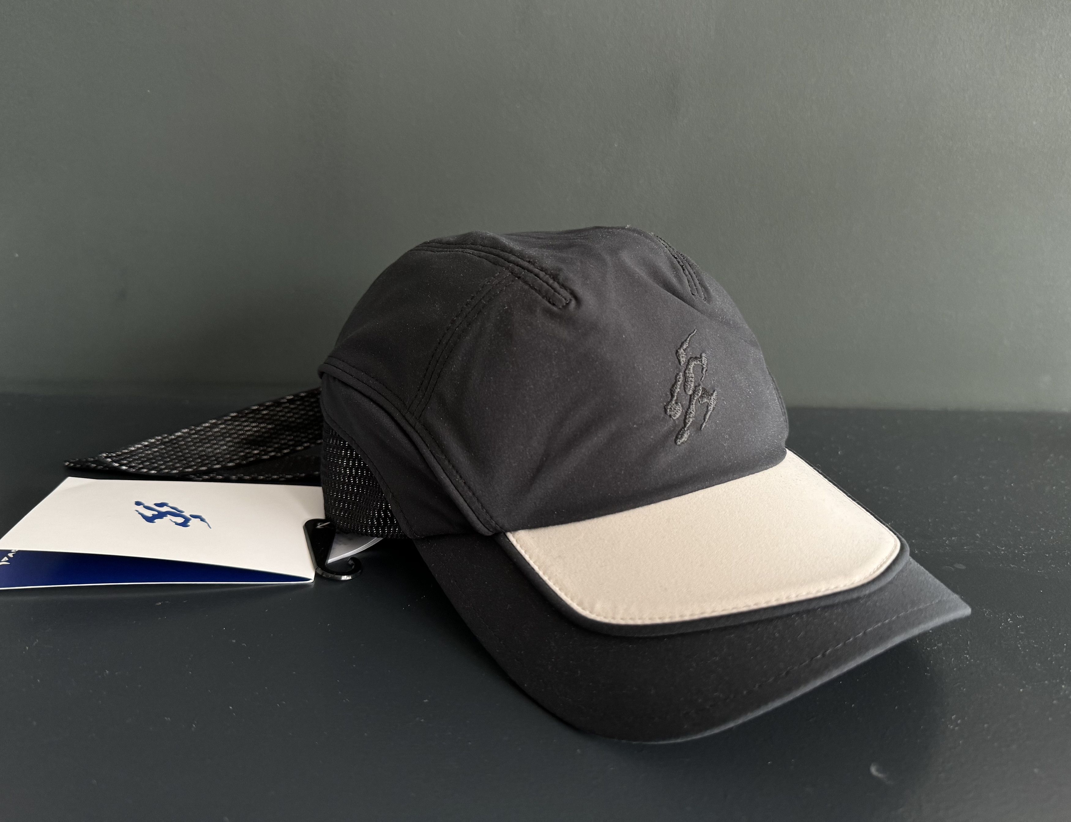 Asics × Kiko Kostadinov Asics x Kiko Kostadinov Novalis Ormosiancy Hat |  Grailed