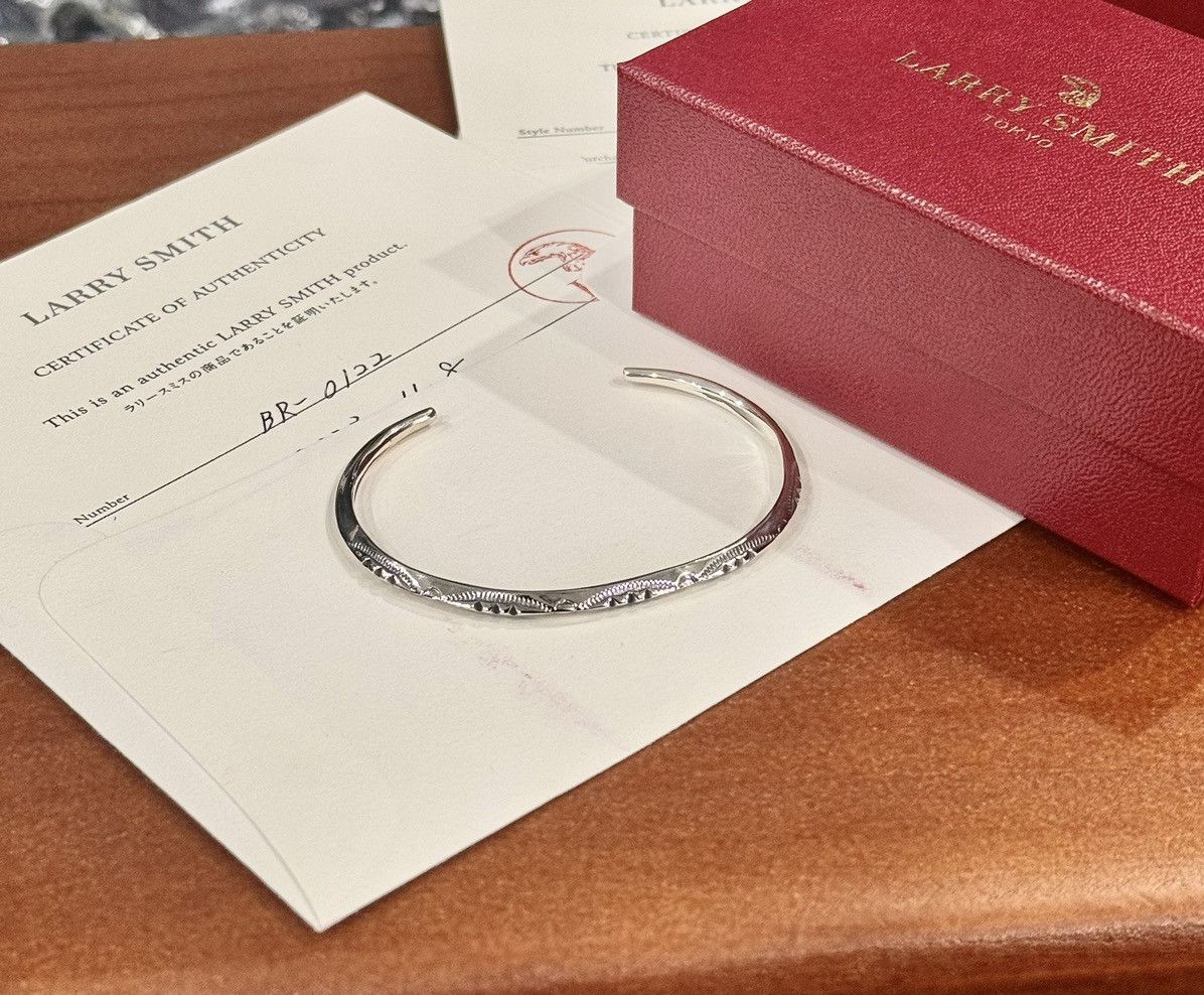 Larry Smith triangle bracelet