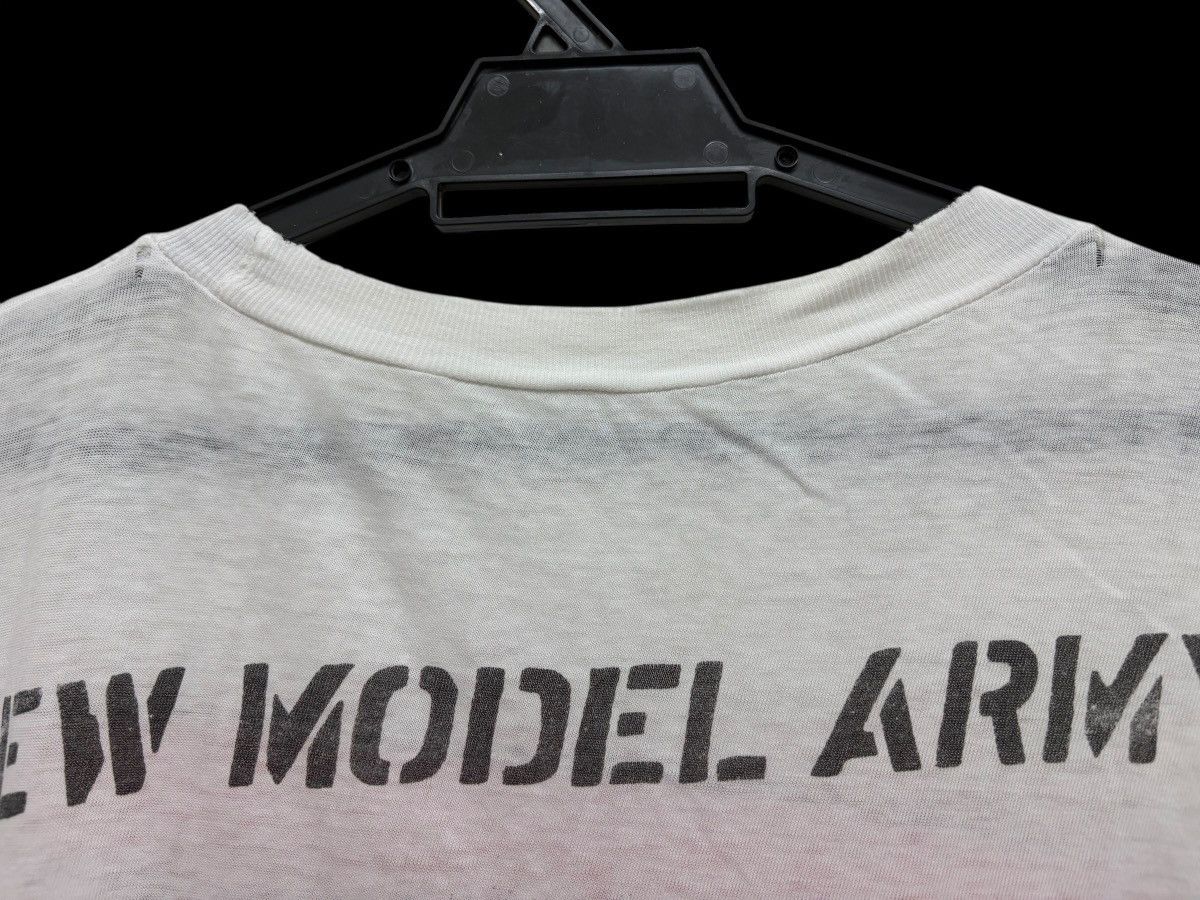 Vintage RARE 🔥 80s SURF WATCH X NEW MODEL ARMY BAND TEE DISTRESSED Size US L / EU 52-54 / 3 - 14 Thumbnail