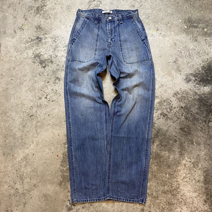 JW ANDERSON SHOE CUT JEANS