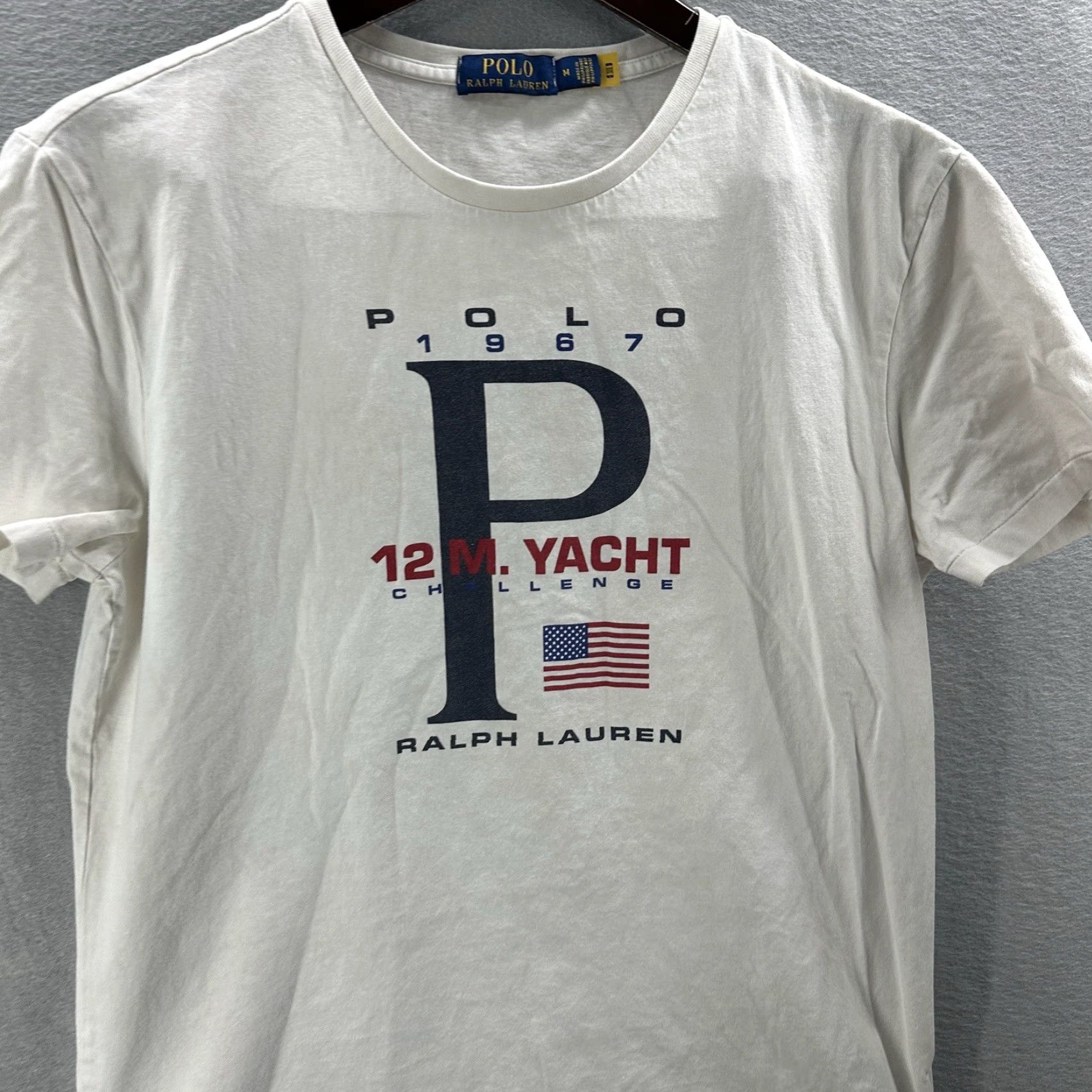 Polo Ralph Lauren Polo Ralph Lauren Shirt Mens M White 1967 Yacht Challenge Flag Logo READ VINTAGE? (But must be from original words only) Size US M / EU 48-50 / 2 - 3 Thumbnail