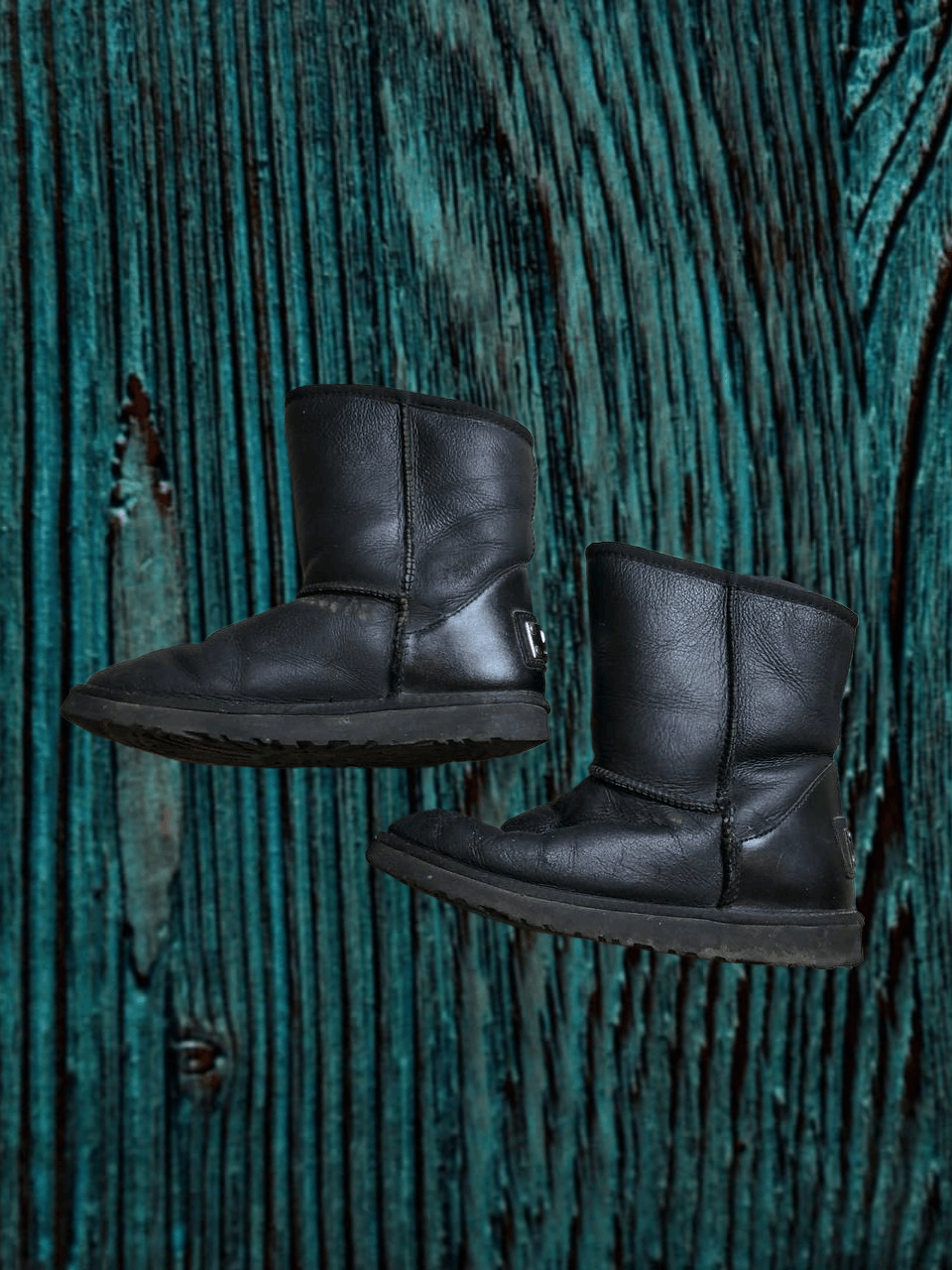 Uggs size 9 Black leather on soft black sheepskin