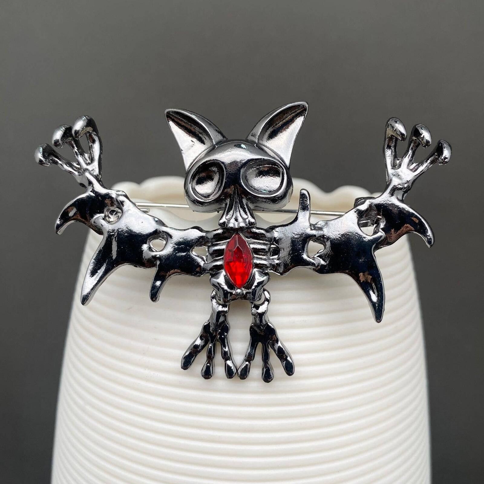 The Unbranded Brand Unique Silver Tone Cat and Bat Gothic Brooch with Red Gem Size ONE SIZE - 1 Thumbnail