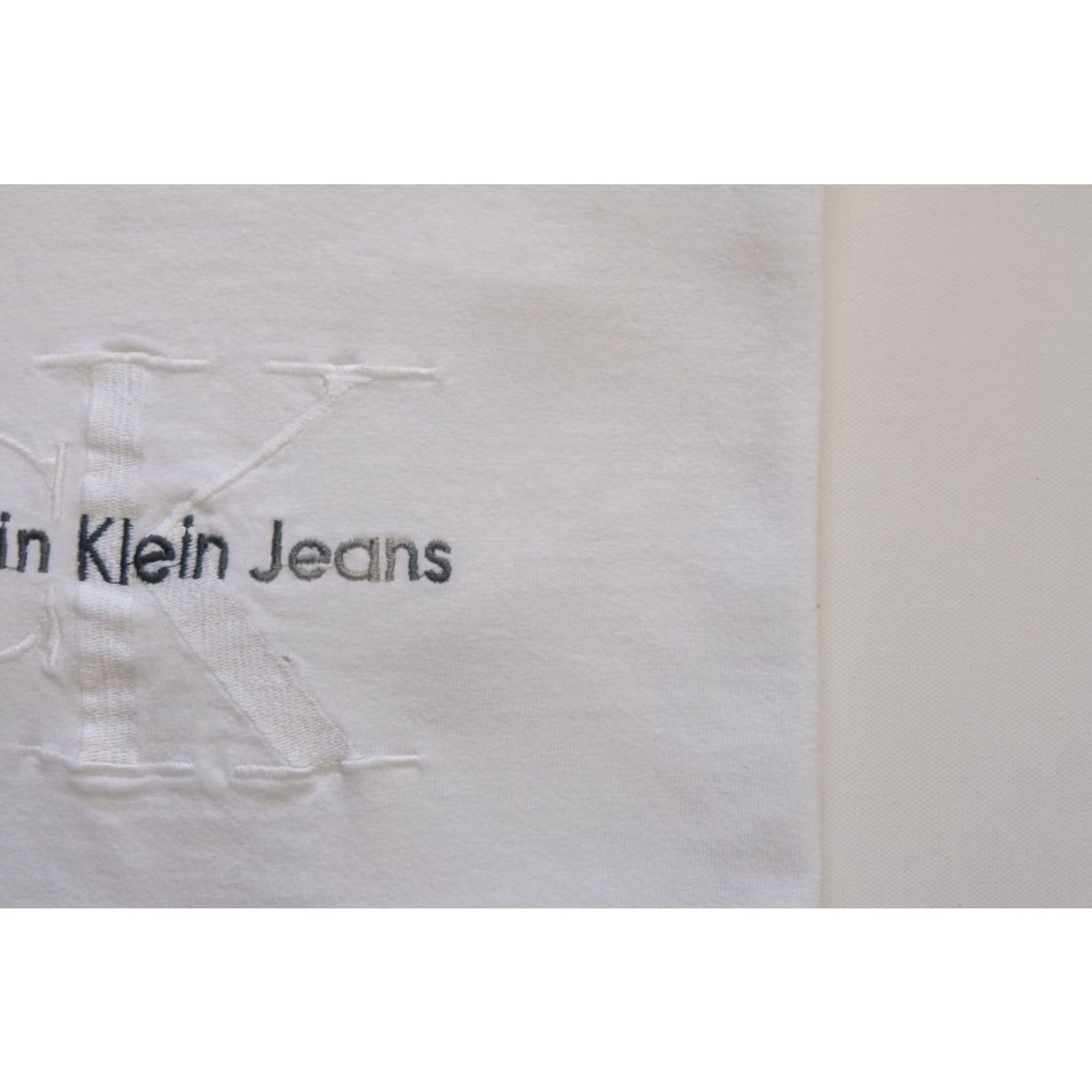 Calvin Klein CALVIN KLEIN JEANS USA MADE VTG 90s RETRO GRAPHIC DISTRESSED WHITE T SHIRT SZ L Mens Shirt Size US L / EU 52-54 / 3 - 4 Thumbnail