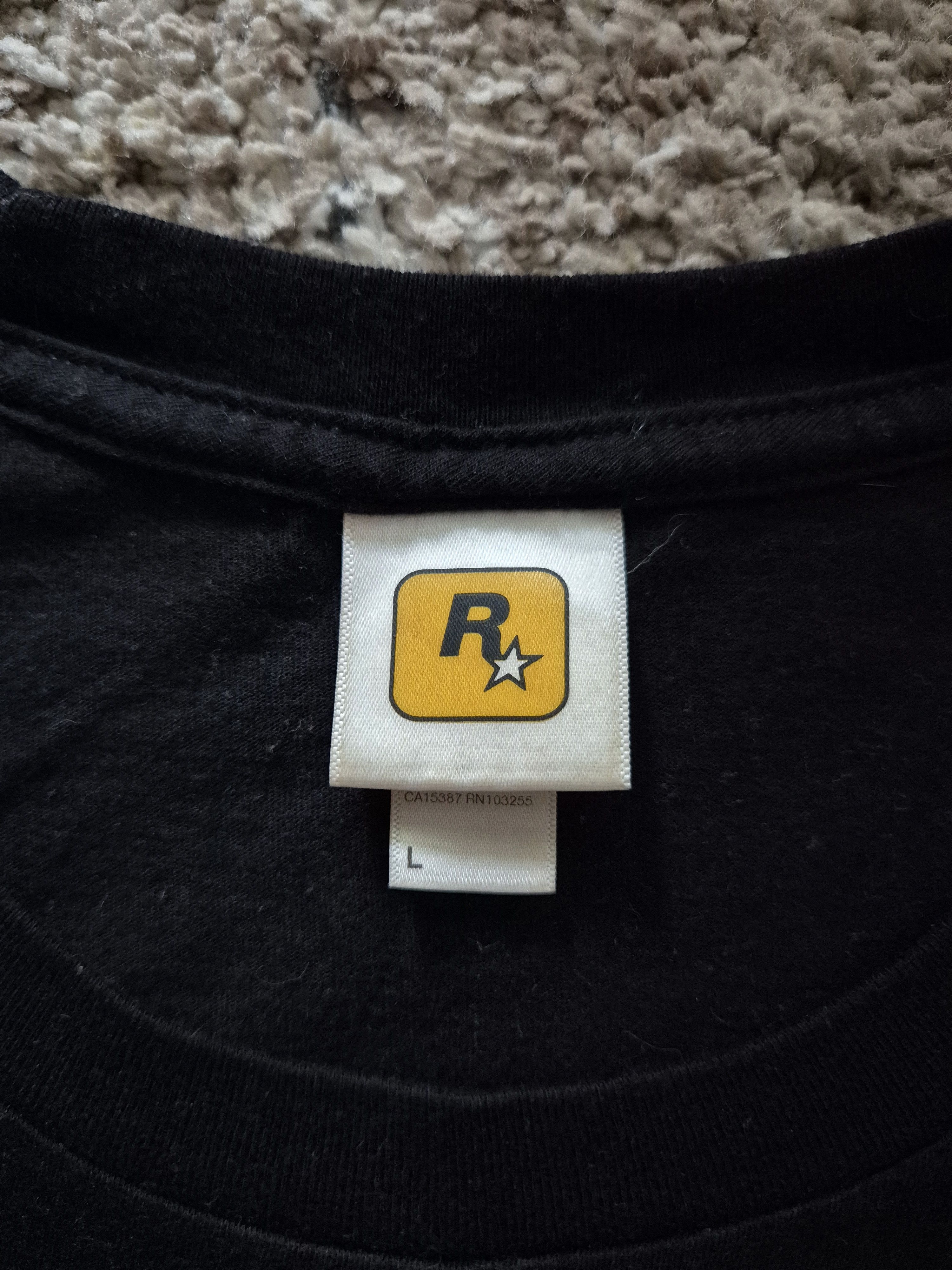 Rockstar Games Grand Theft Auto V Love Fist Rockstar Games T-shirt size L Size US L / EU 52-54 / 3 - 4 Thumbnail