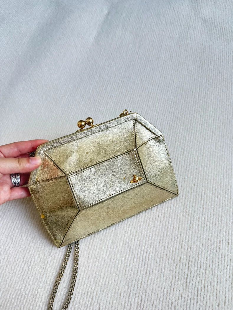 Vivienne Westwood size os Used goat skin and golden turtle