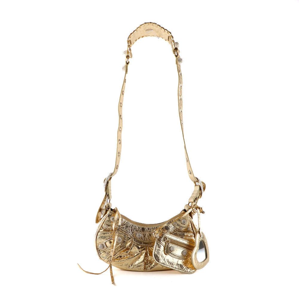 image of Balenciaga Balenciaga Handbags Le Cagole in Gold, Women's