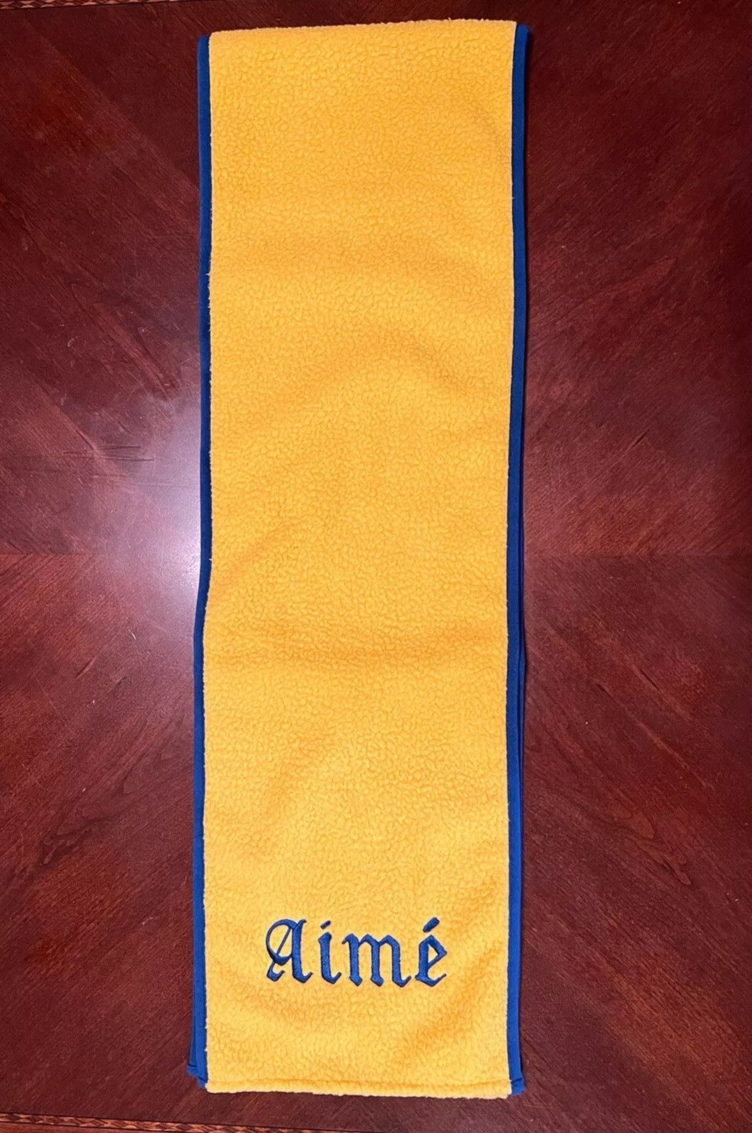 Aime Leon Dore Aime Leon Dore ALD Gothic Fleece Scarf Oil Yellow 66” x 10” Size ONE SIZE - 1 Thumbnail