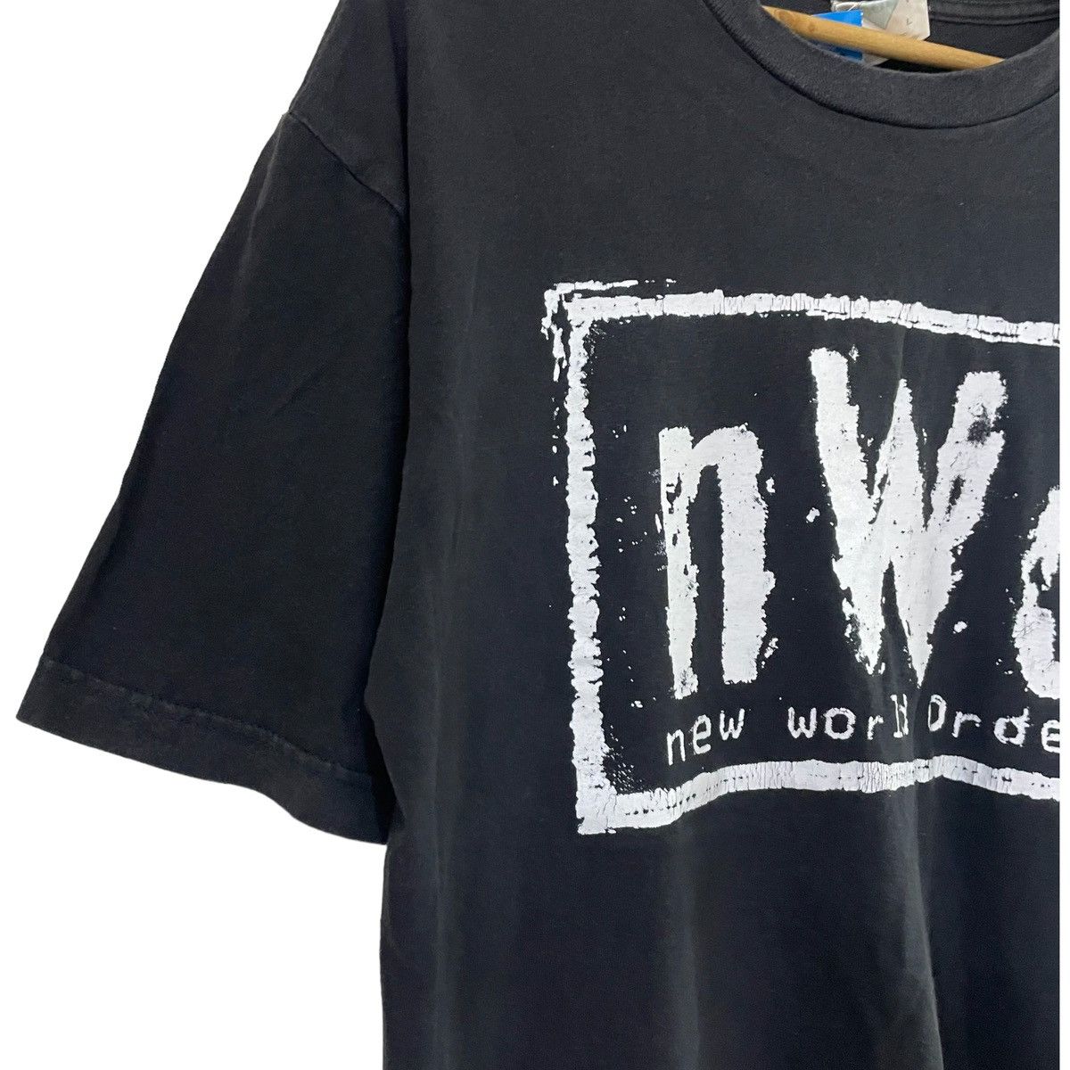 New Order × Vintage Vintage 90’s N.W.O The Mew World Order Black Tee Size US L / EU 52-54 / 3 - 5 Thumbnail