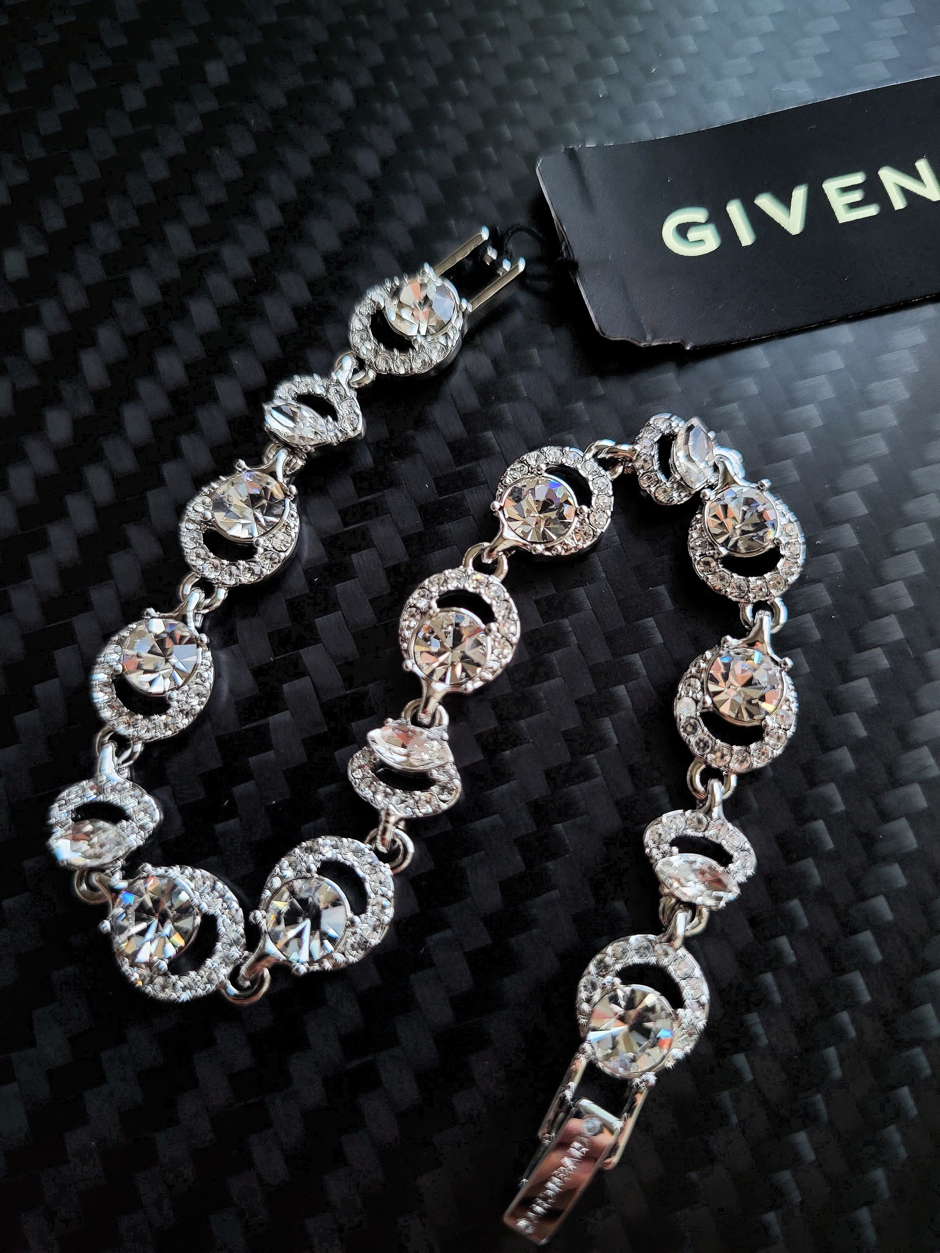 Pre-owned Givenchy Silver Halo Eye Flex Crystal Bracelet