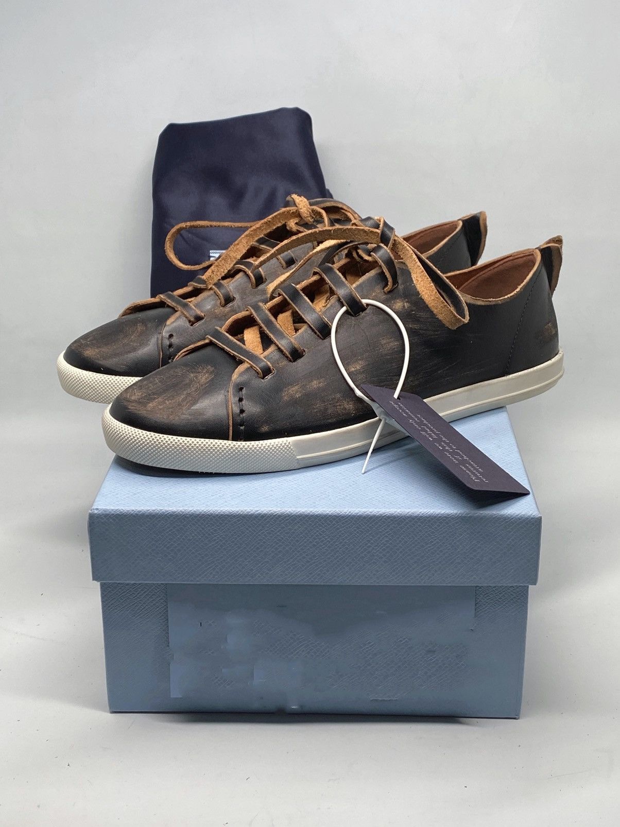 Prada Prada Distressed Low-Top Leather Sneakers size 38.5 Size US 8.5 / IT 38.5 - 1 Thumbnail
