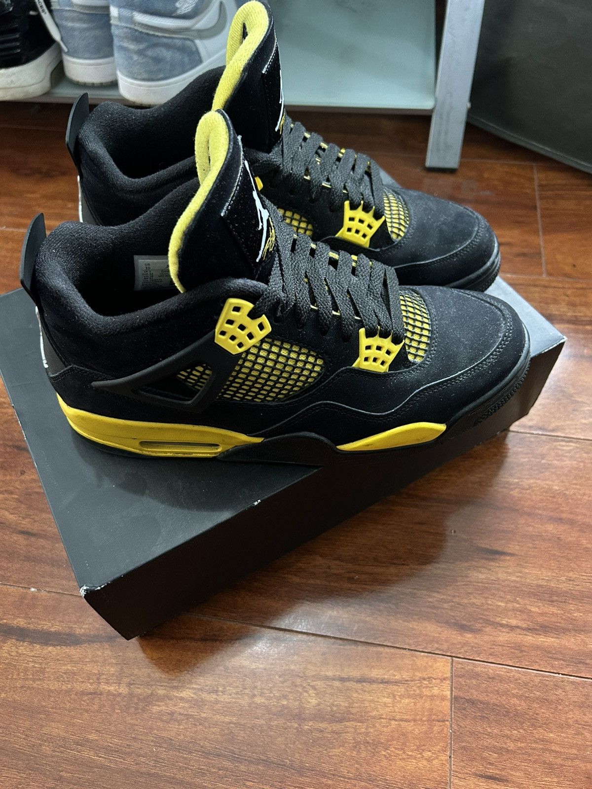Nike Jordan 4 Retros black and yellow Size US 9 / EU 42 - 1 Thumbnail