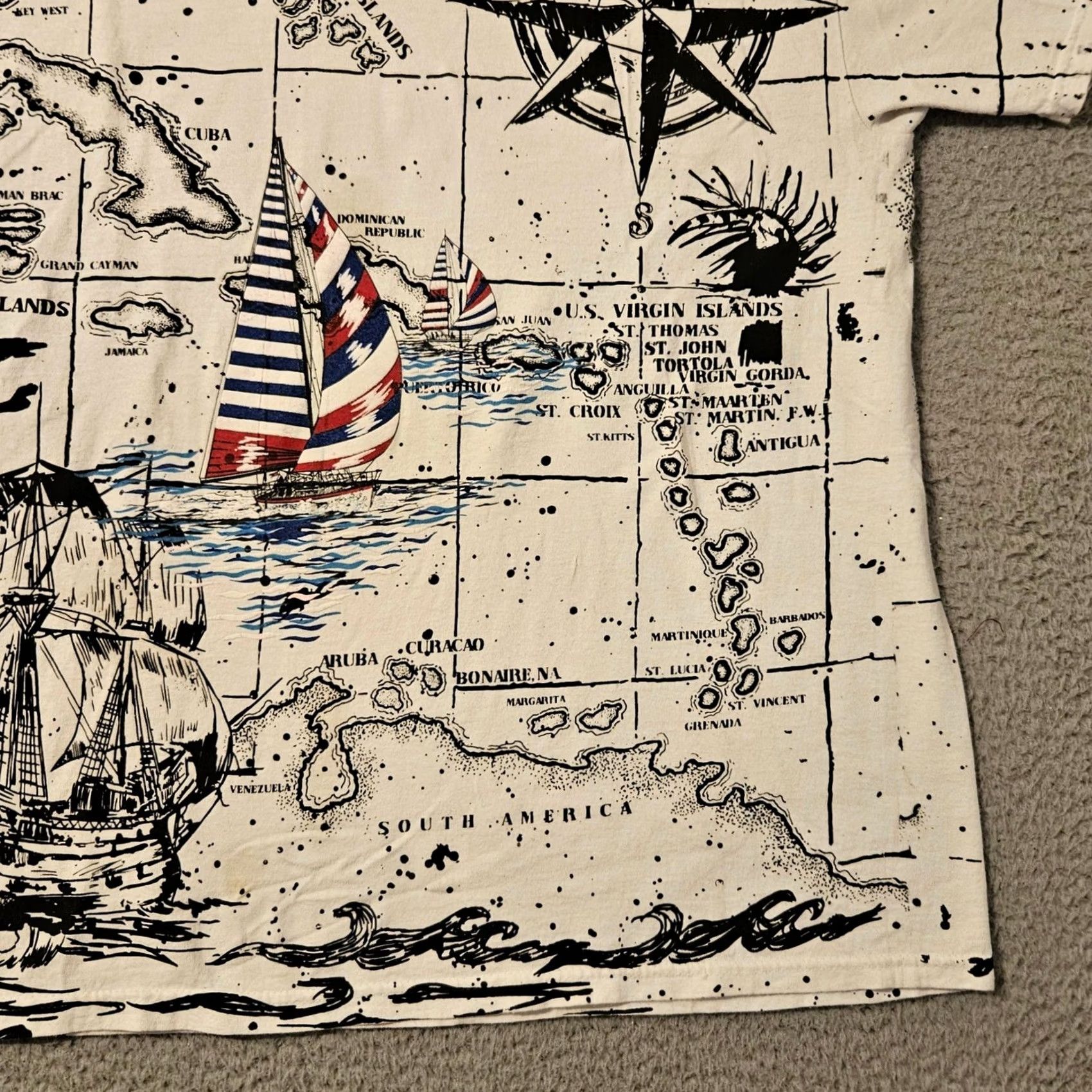 Delta VINTAGE Stanley Michaels AOP Map Caribbean Parrot Pirate Ship Graphic Shirt XL White Stain 29.5 22.5 Inches Mens Size US XL / EU 56 / 4 - 5 Thumbnail
