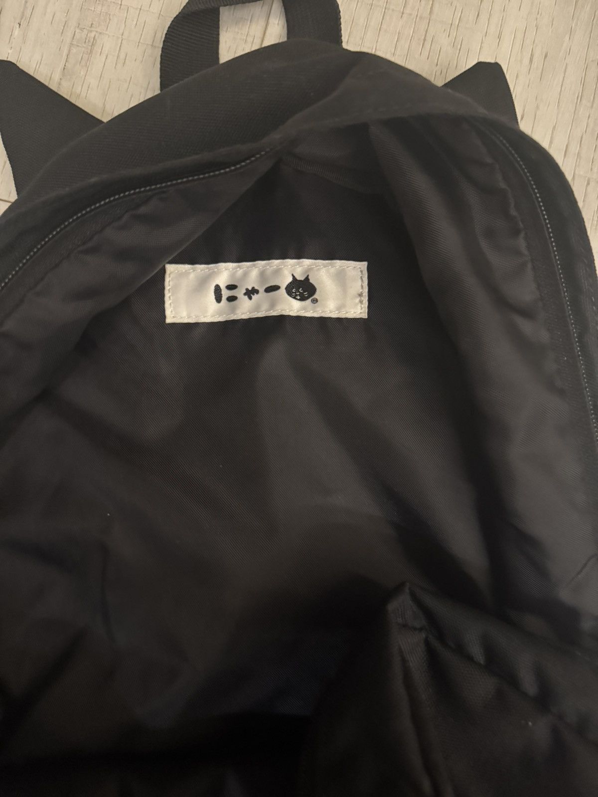 Ne-net issey miyake logo backpack
