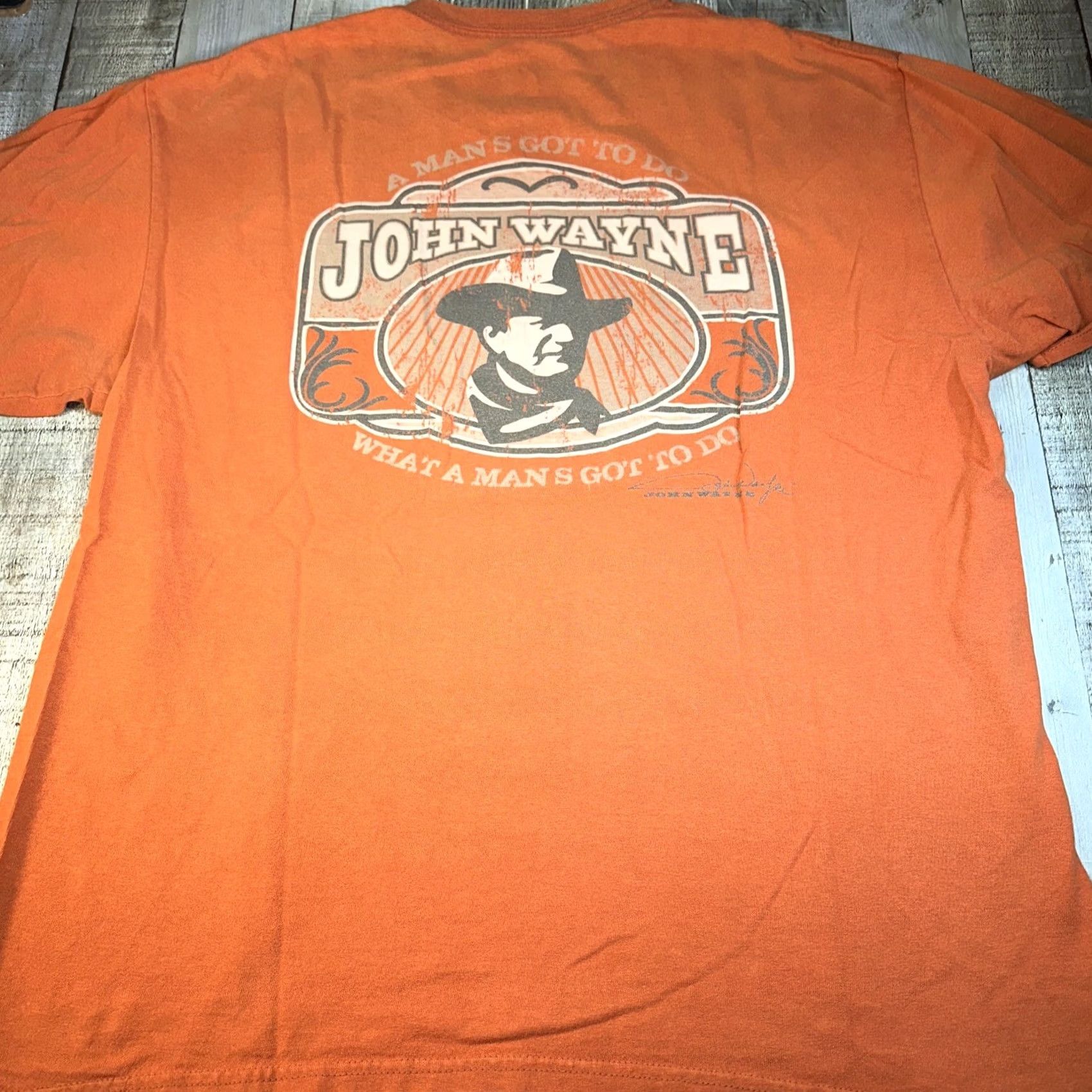 Vintage John Wayne Mens L Shirt Orange Logo Burnt Cotton Western Tee Regular Fit Short Sleeve Crew Neck T-Shirt Quotes Vintage No (adjusted per constraints) Size US L / EU 52-54 / 3 - 4 Thumbnail