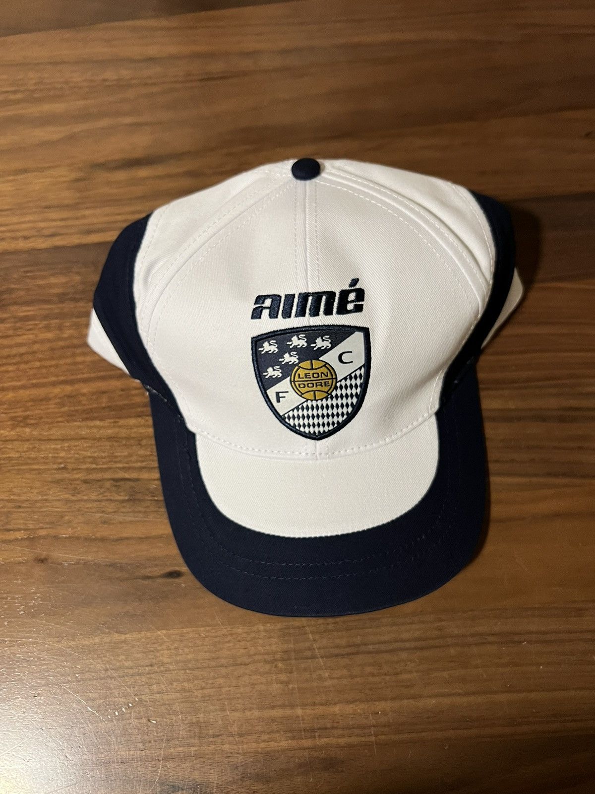 Aime Leon Dore Aime Leon Dore ALD Team Leon Logo Soccer Hat Cap White/Navy Size ONE SIZE - 1 Thumbnail