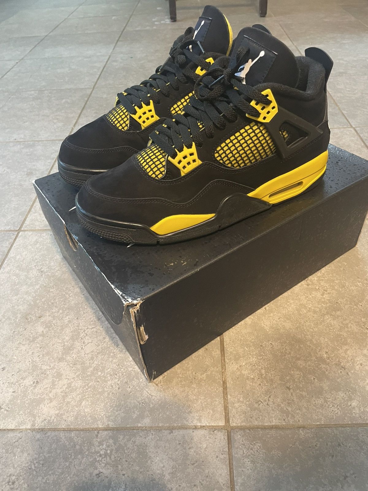 Jordan Brand Black and Yellow “Thunder” Jordan 4s Size US 9.5 / EU 42-43 - 2 Thumbnail