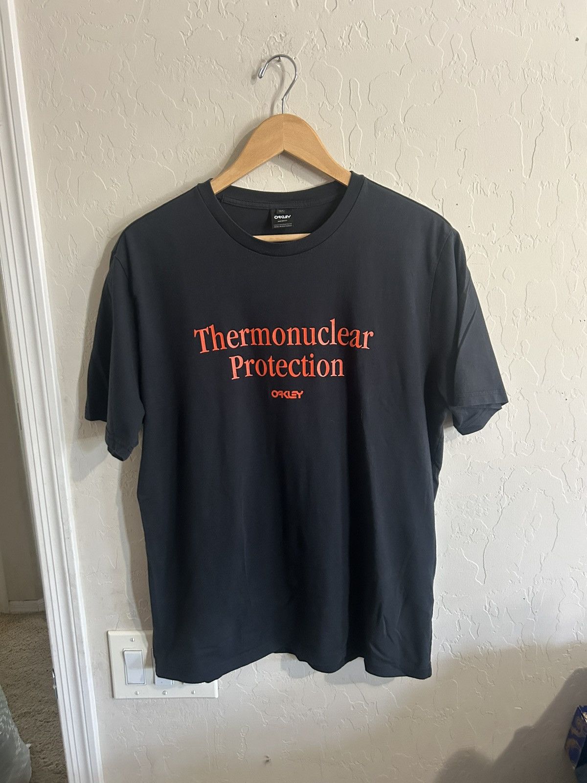 Oakley × Vintage Vintage Oakley Thermonuclear Protection Shirt Size L Size US L / EU 52-54 / 3 - 4 Thumbnail