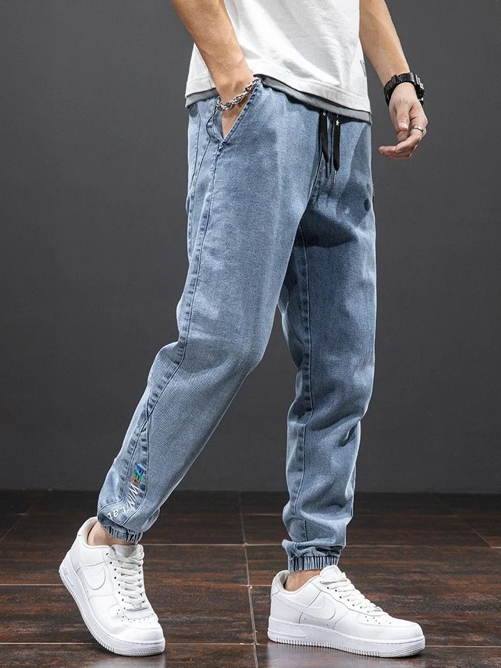 image of Vintage Y2K Fashion Streetwear Denim Jogger Pants in Blue/Black/Gray, Men's (Size 34)