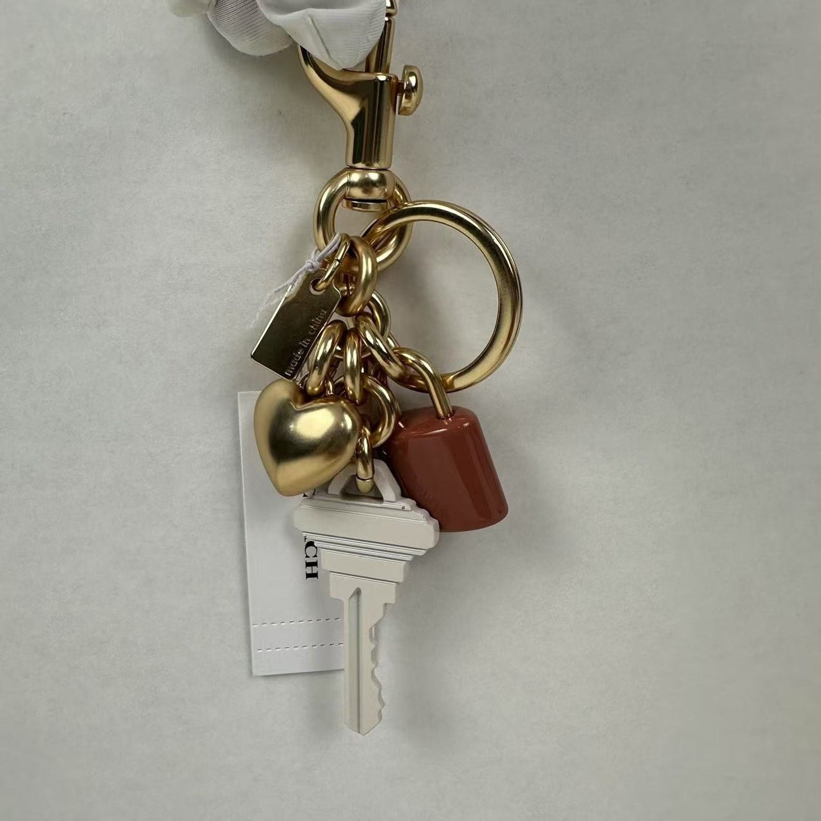 Coach Coach Key Cluster Bag Charm Keychain Gold Pink White Size ONE SIZE - 4 Thumbnail