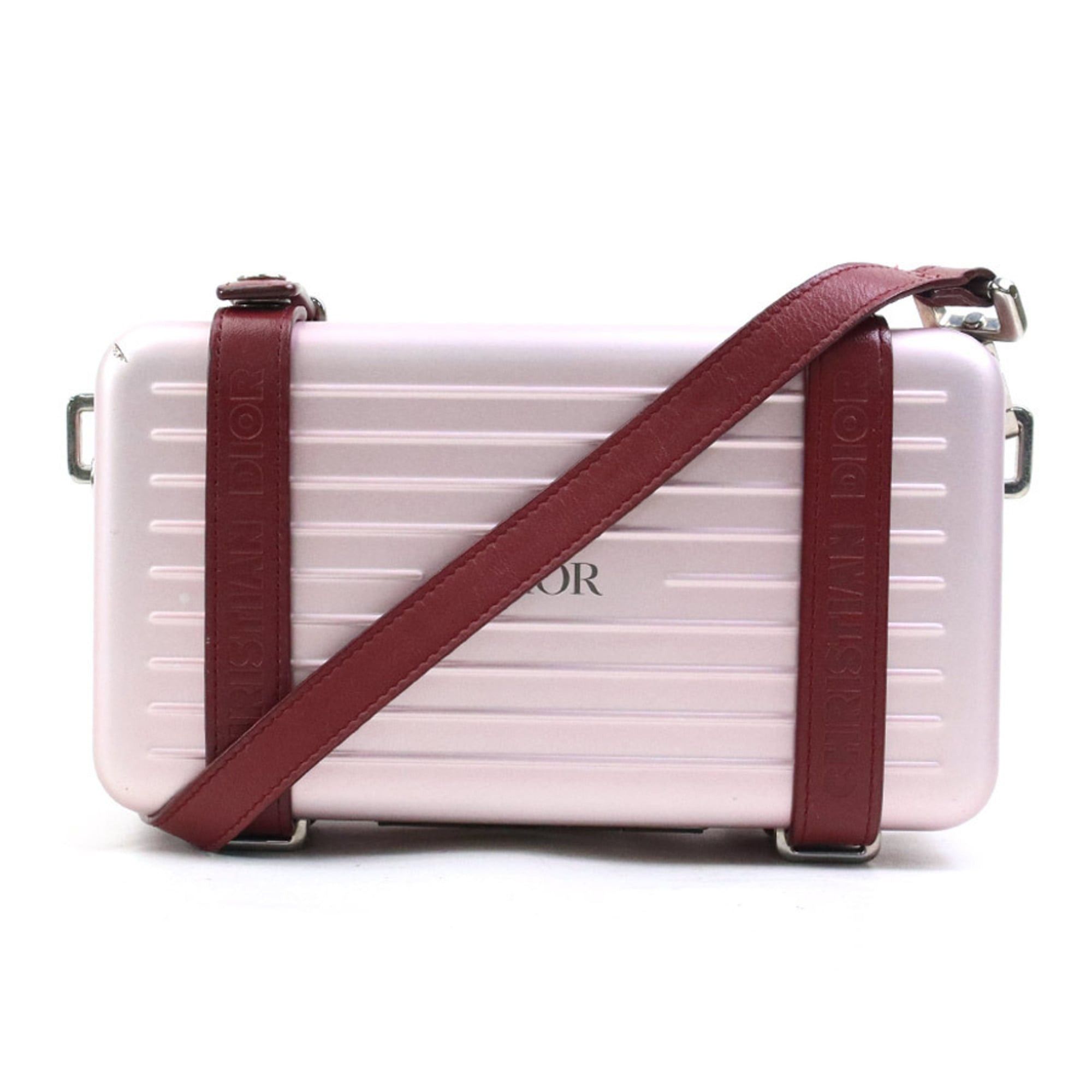 Dior Christian Dior crossbody shoulder bag, wallet, and Rimowa personal clutch bag in leather, aluminum, metallic pink, burgundy, silver. Free shipping. (e61543a) Size ONE SIZE - 1 Thumbnail